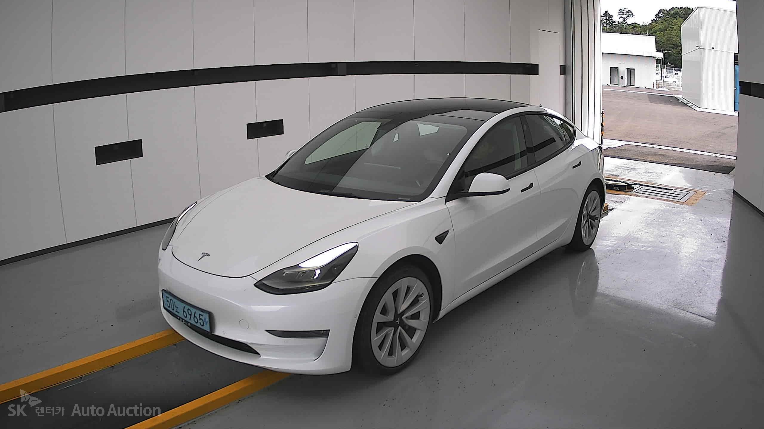 Tesla Model 3 2022 — صورة 11