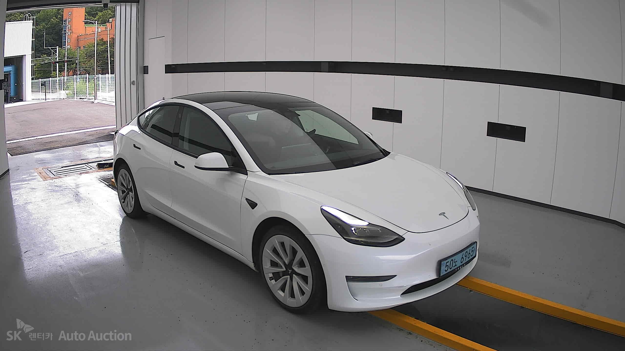 Tesla Model 3 2022 — صورة 21