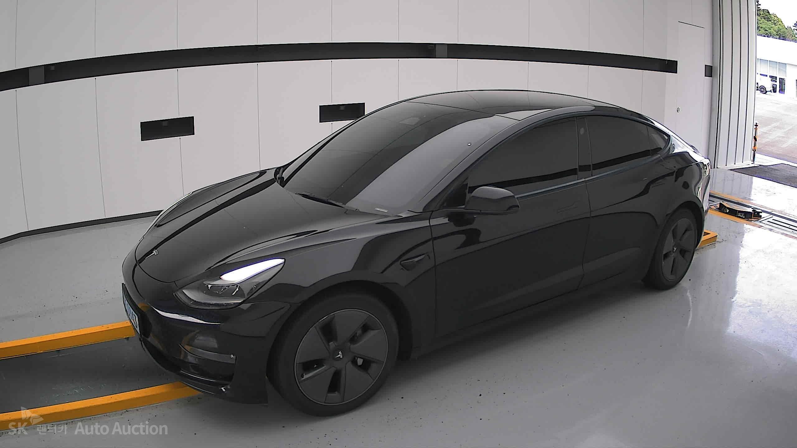 Tesla Model 3 2022 — صورة 12