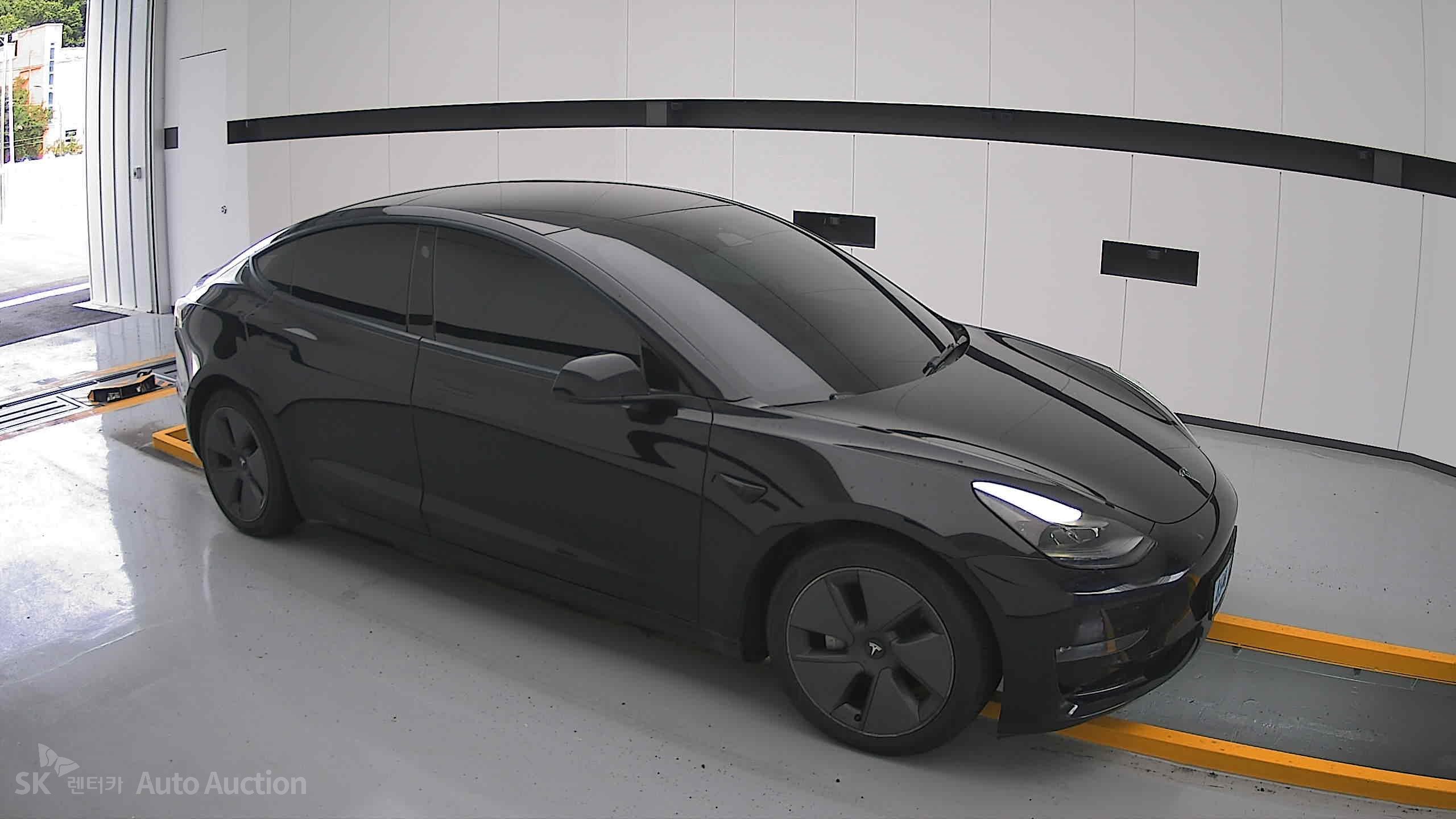 Tesla Model 3 2022 — صورة 20