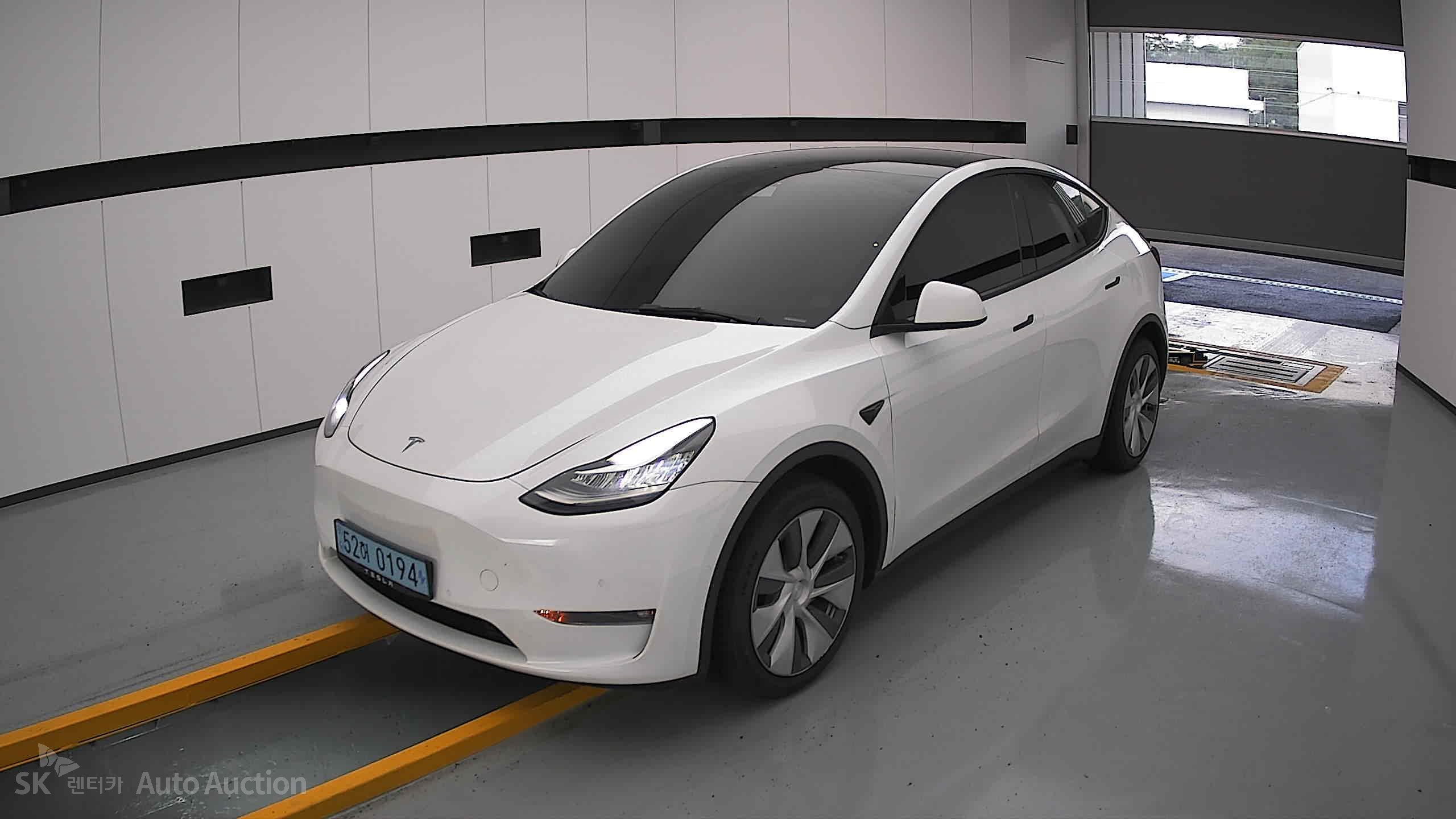 Tesla Model Y 2022 — صورة 11