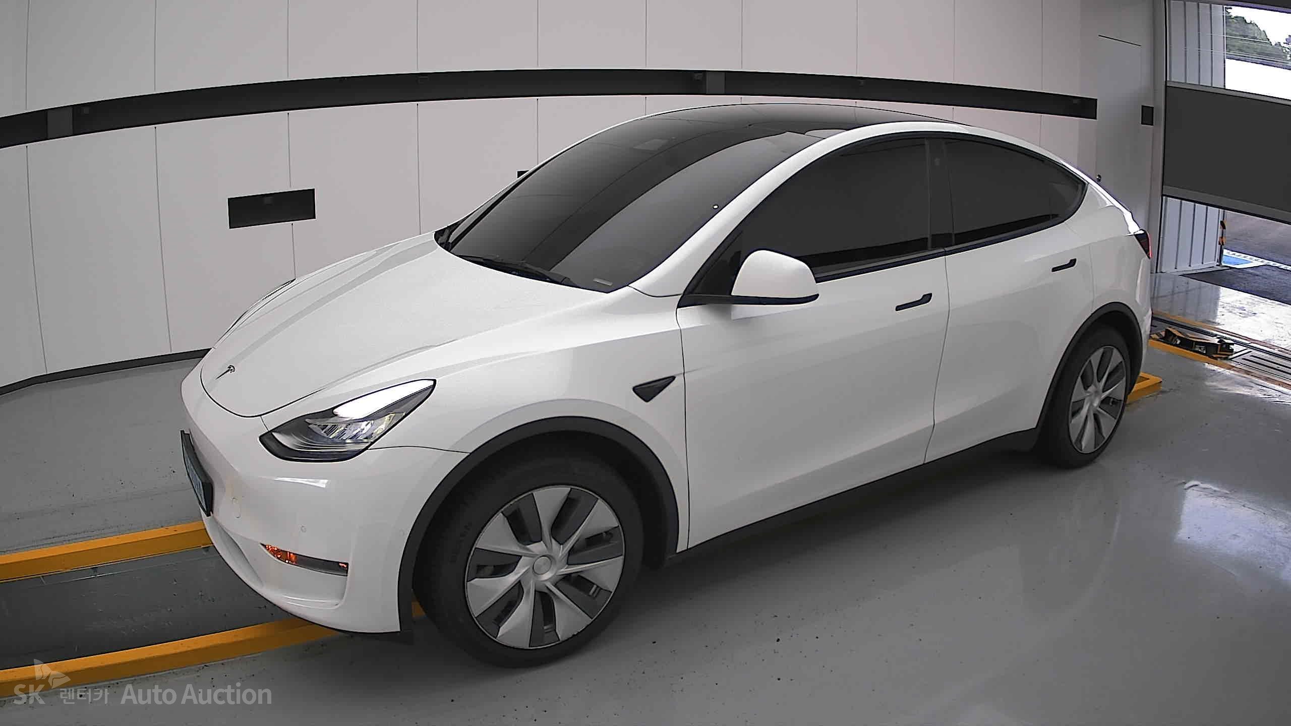Tesla Model Y 2022 — صورة 12