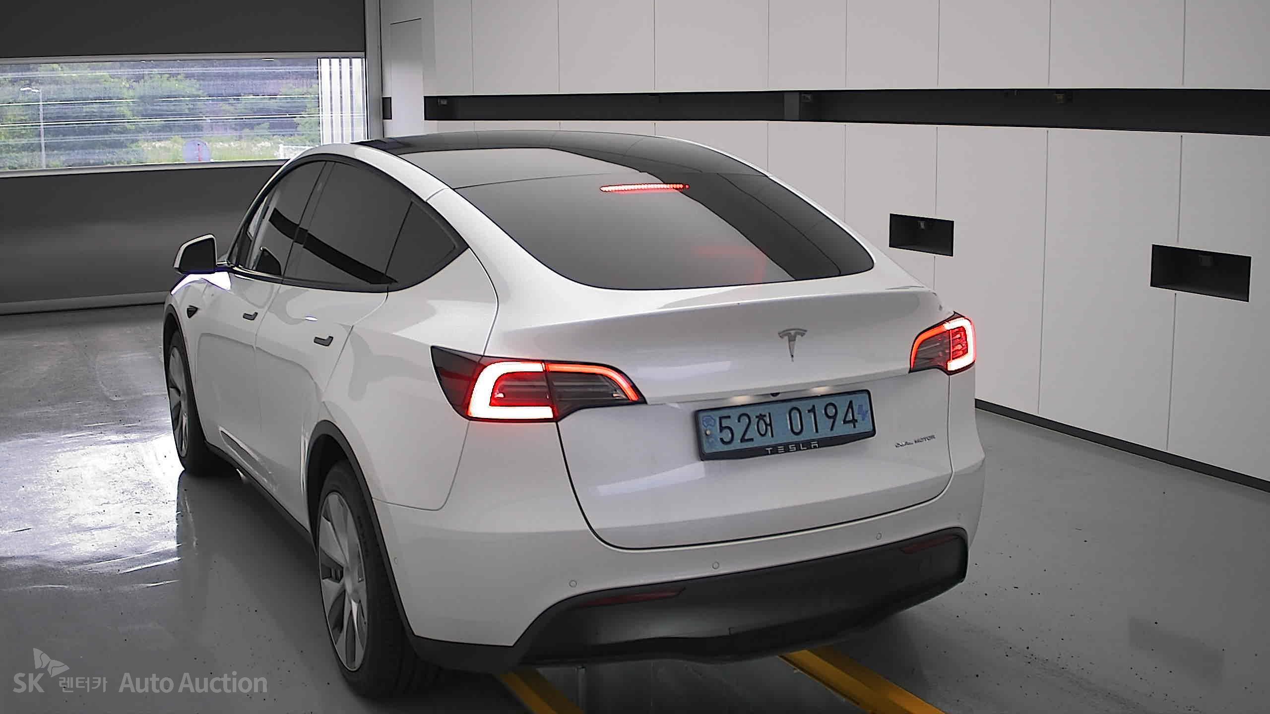 Tesla Model Y 2022 — صورة 15