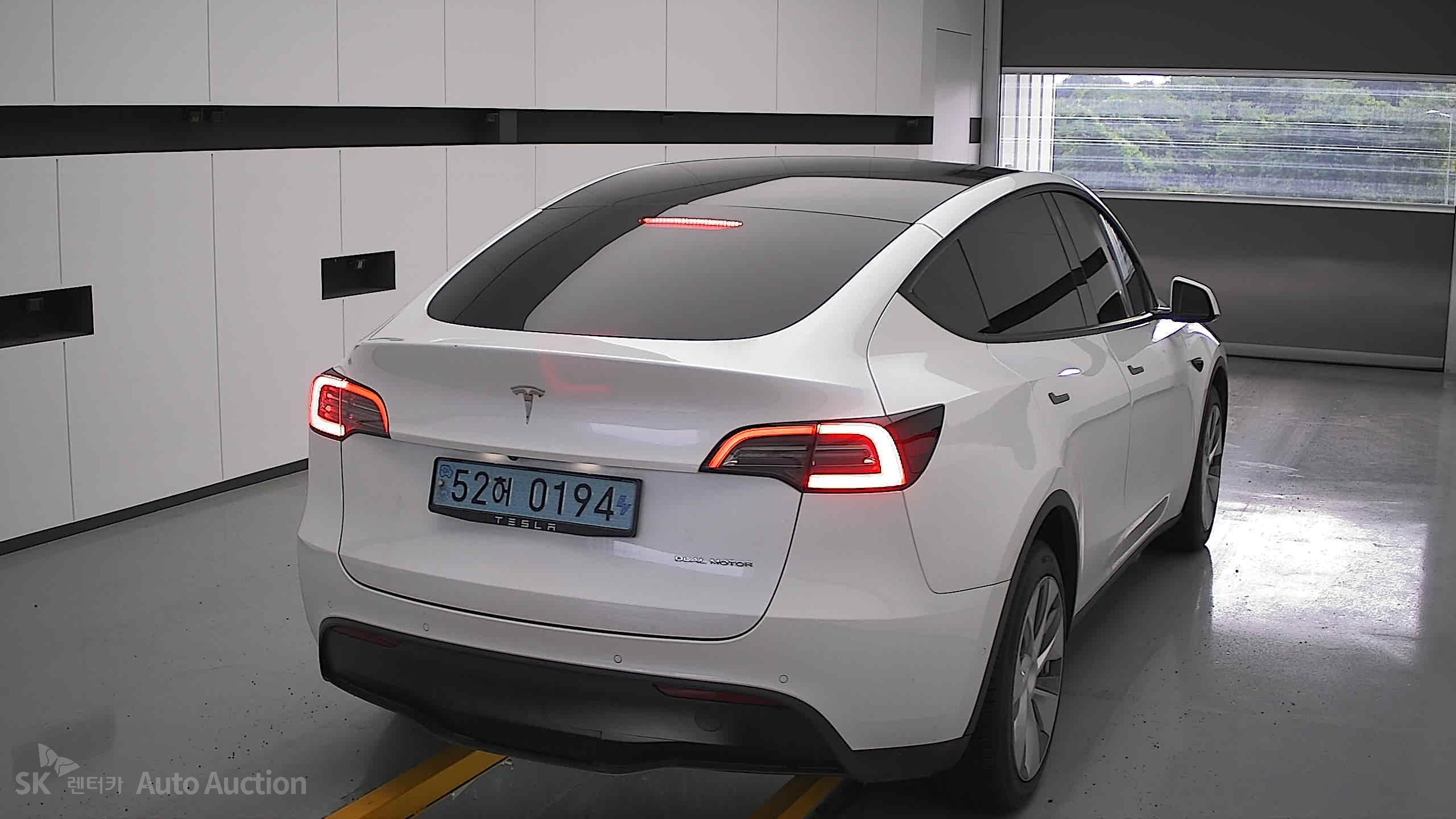 Tesla Model Y 2022 — صورة 16
