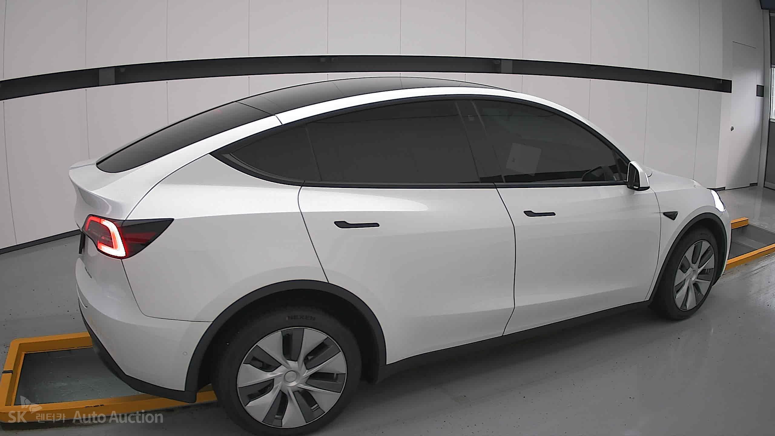 Tesla Model Y 2022 — صورة 18