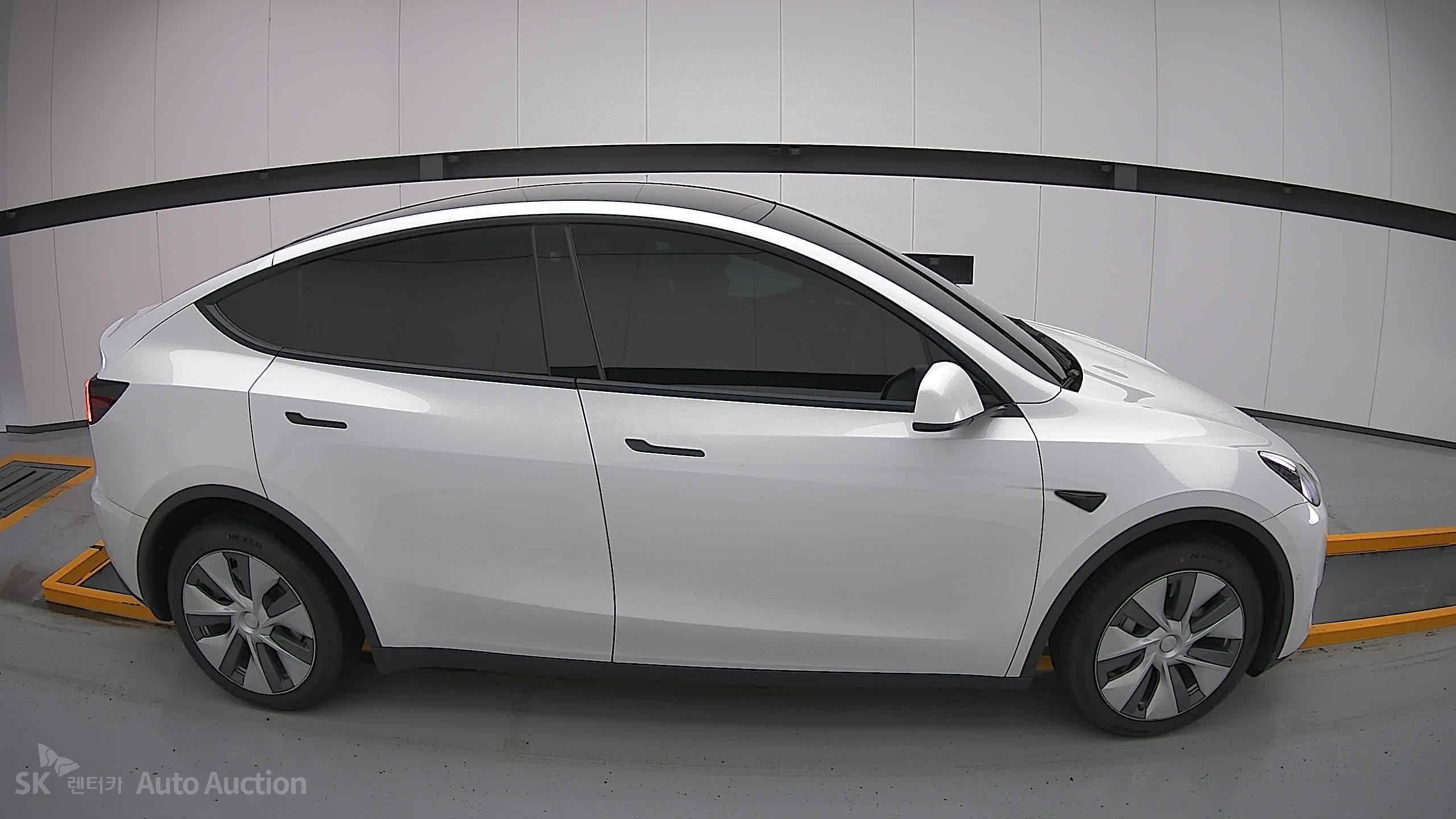 Tesla Model Y 2022 — صورة 19