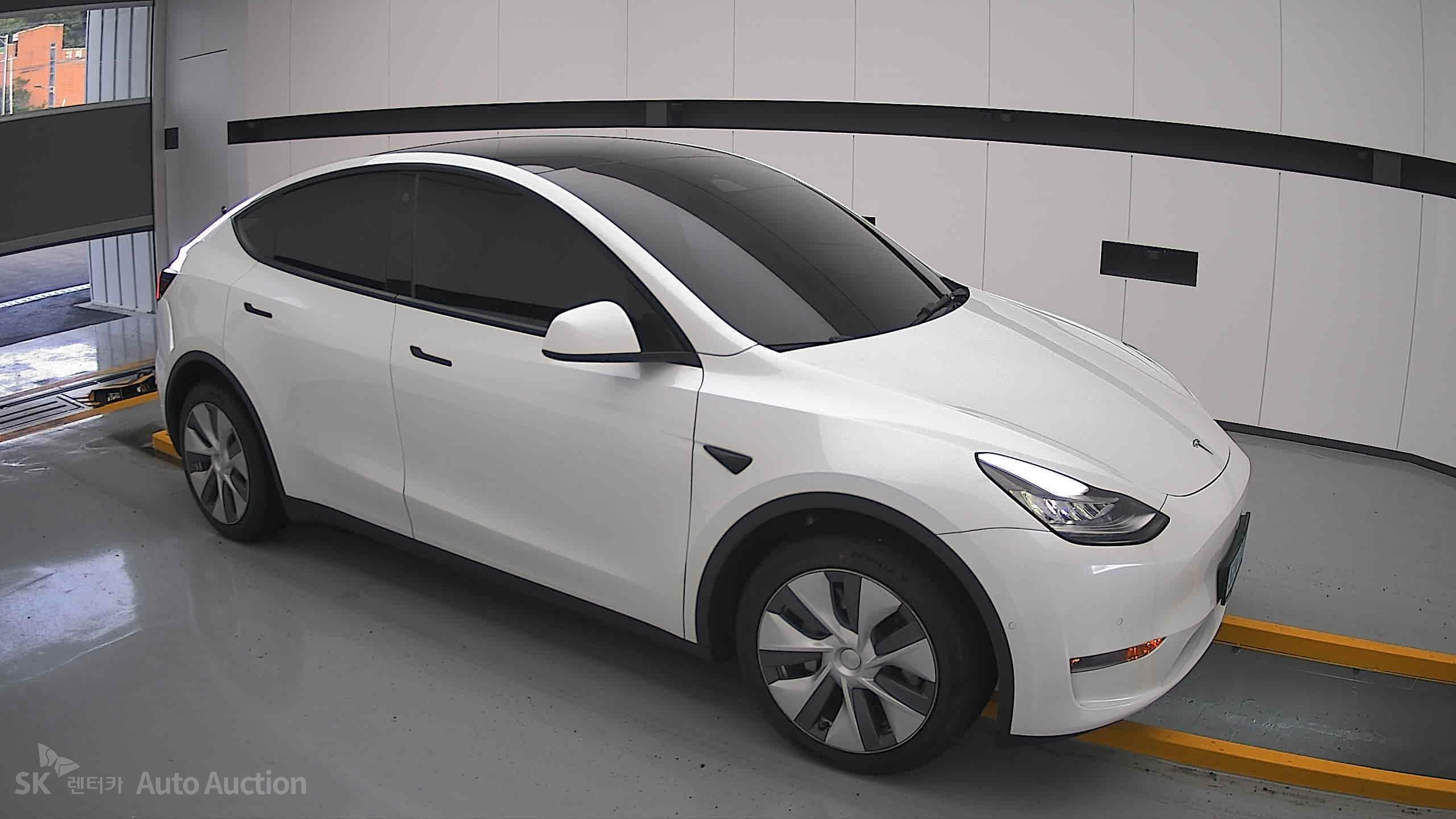 Tesla Model Y 2022 — صورة 20