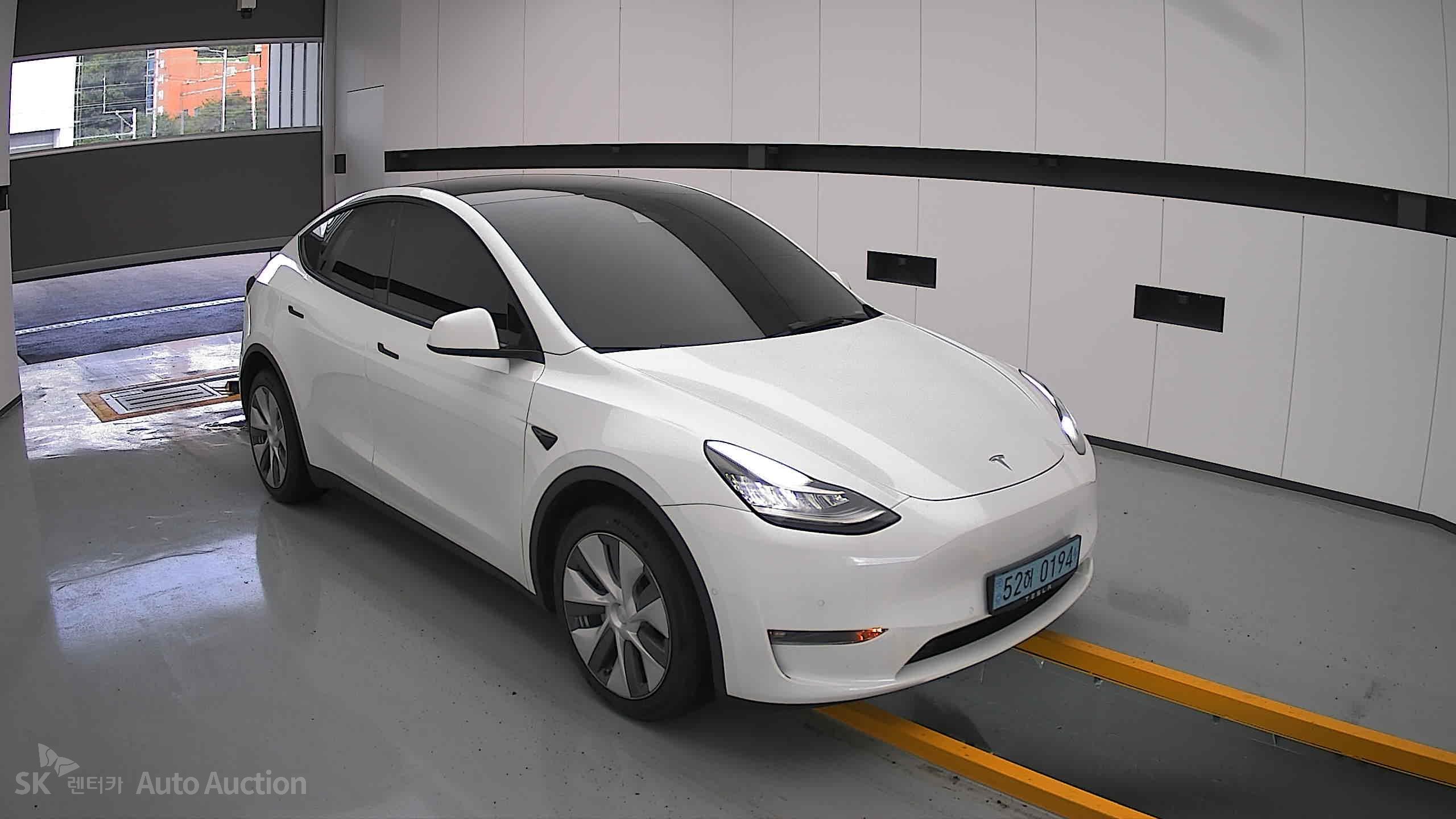 Tesla Model Y 2022 — صورة 21