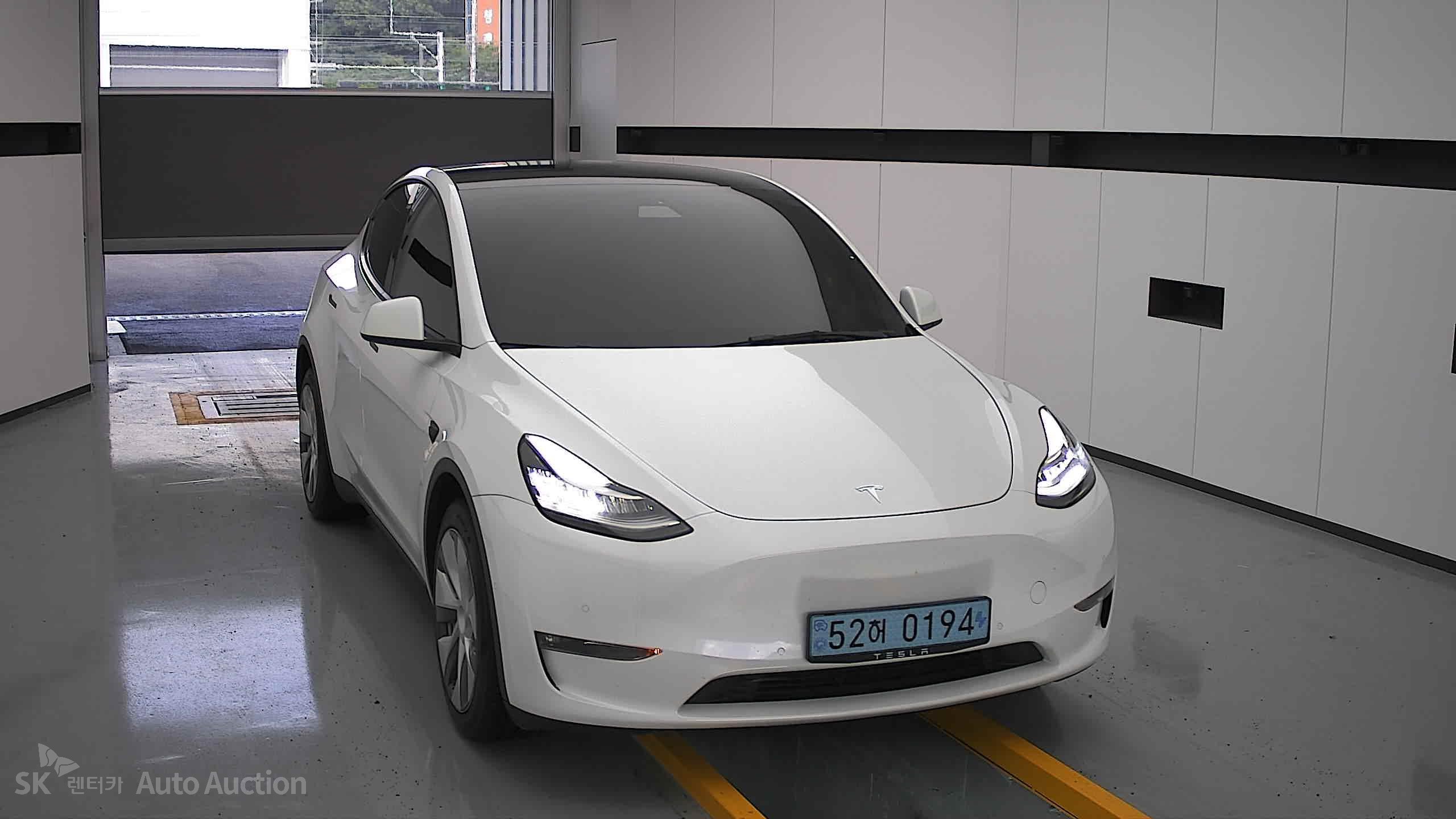 Tesla Model Y 2022 — صورة 22