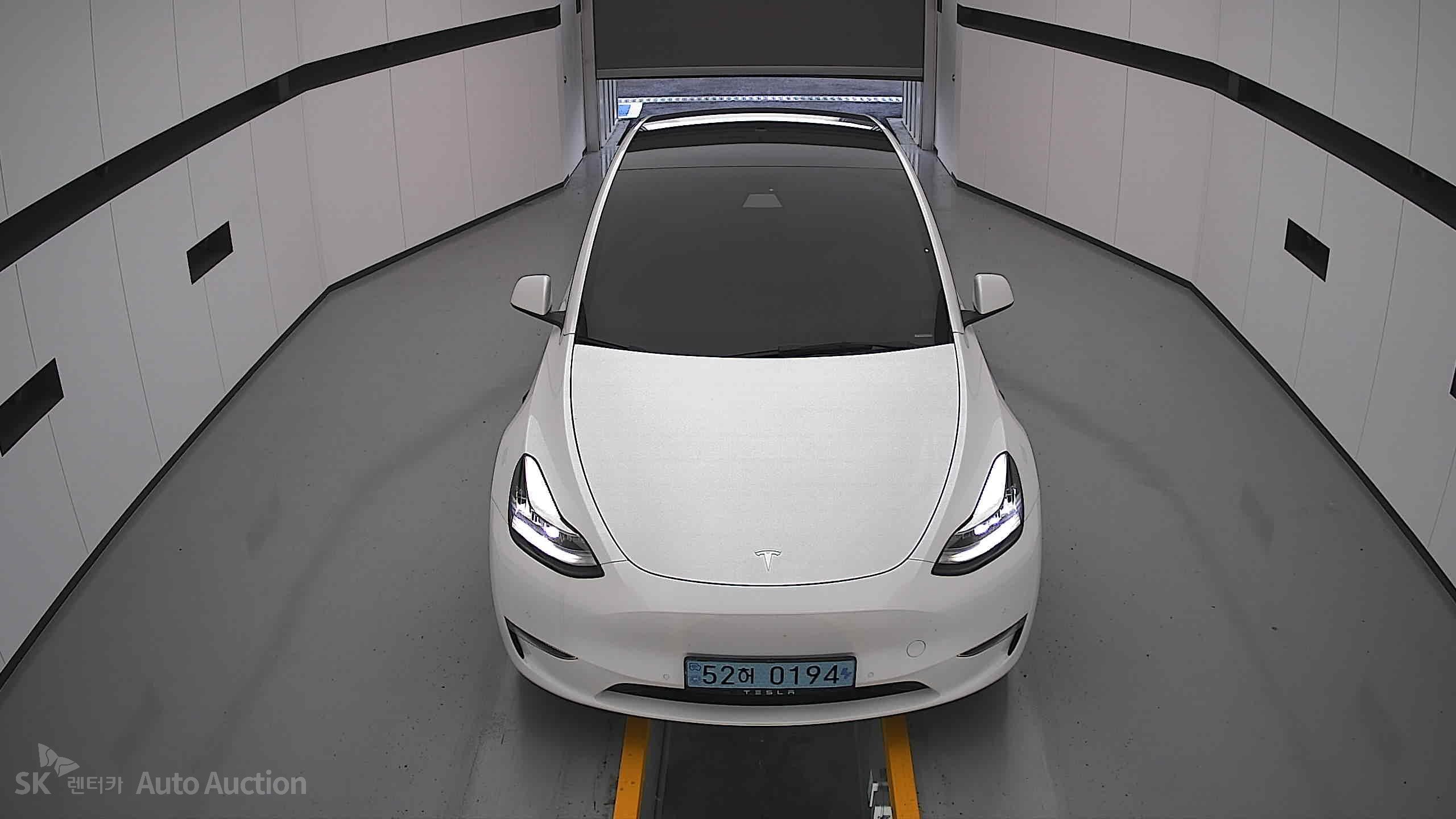 Tesla Model Y 2022 — صورة 24