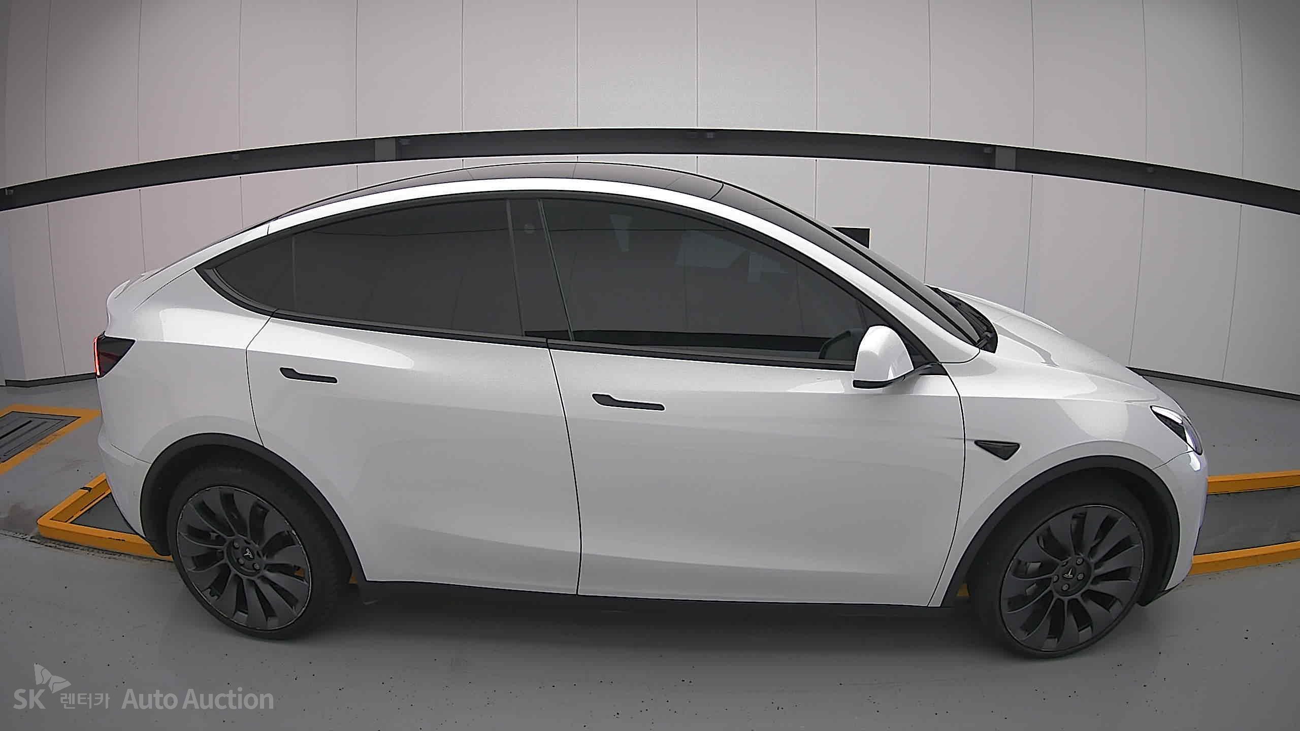 Tesla Model Y 2022 — صورة 19