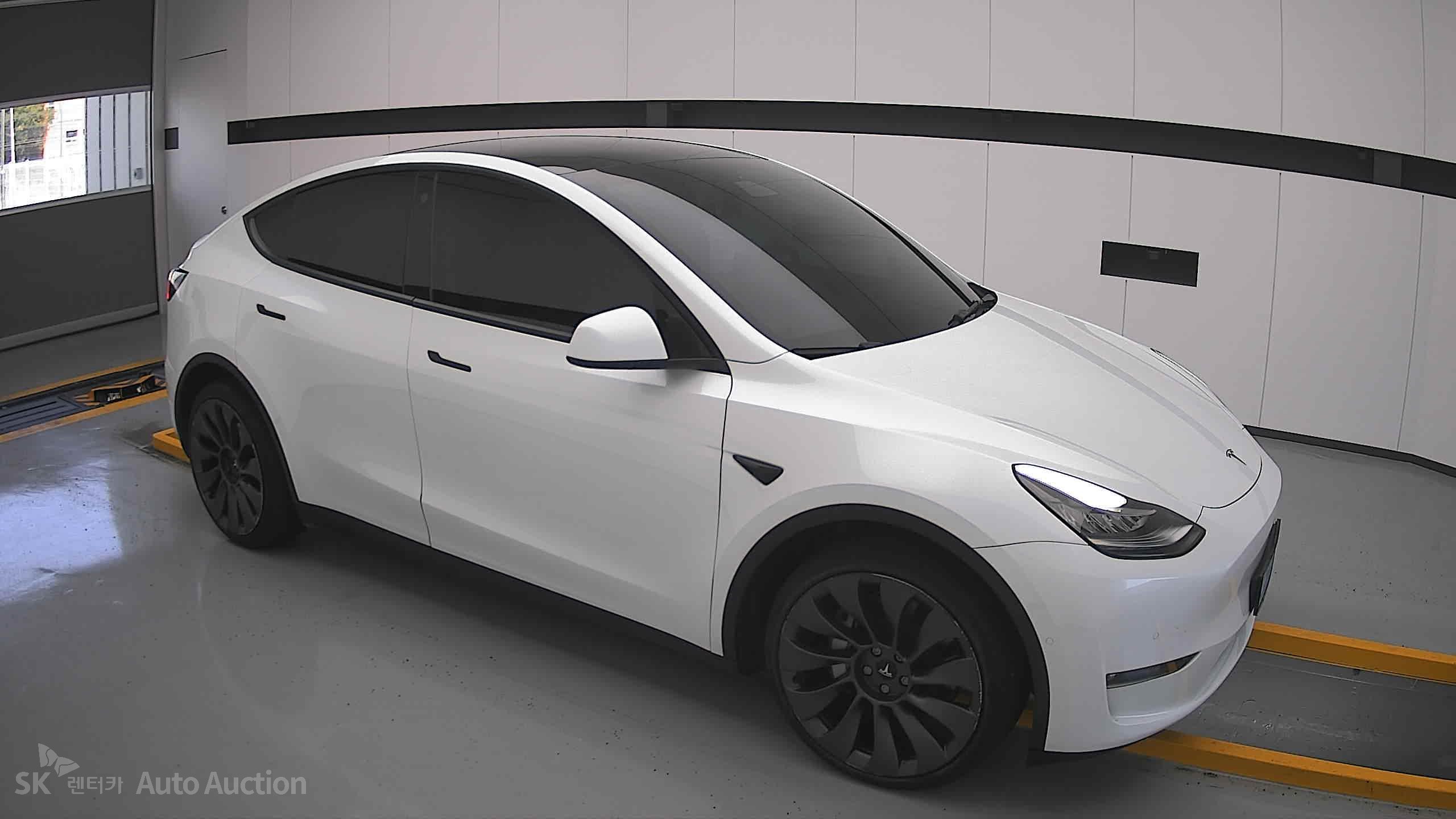Tesla Model Y 2022 — صورة 20