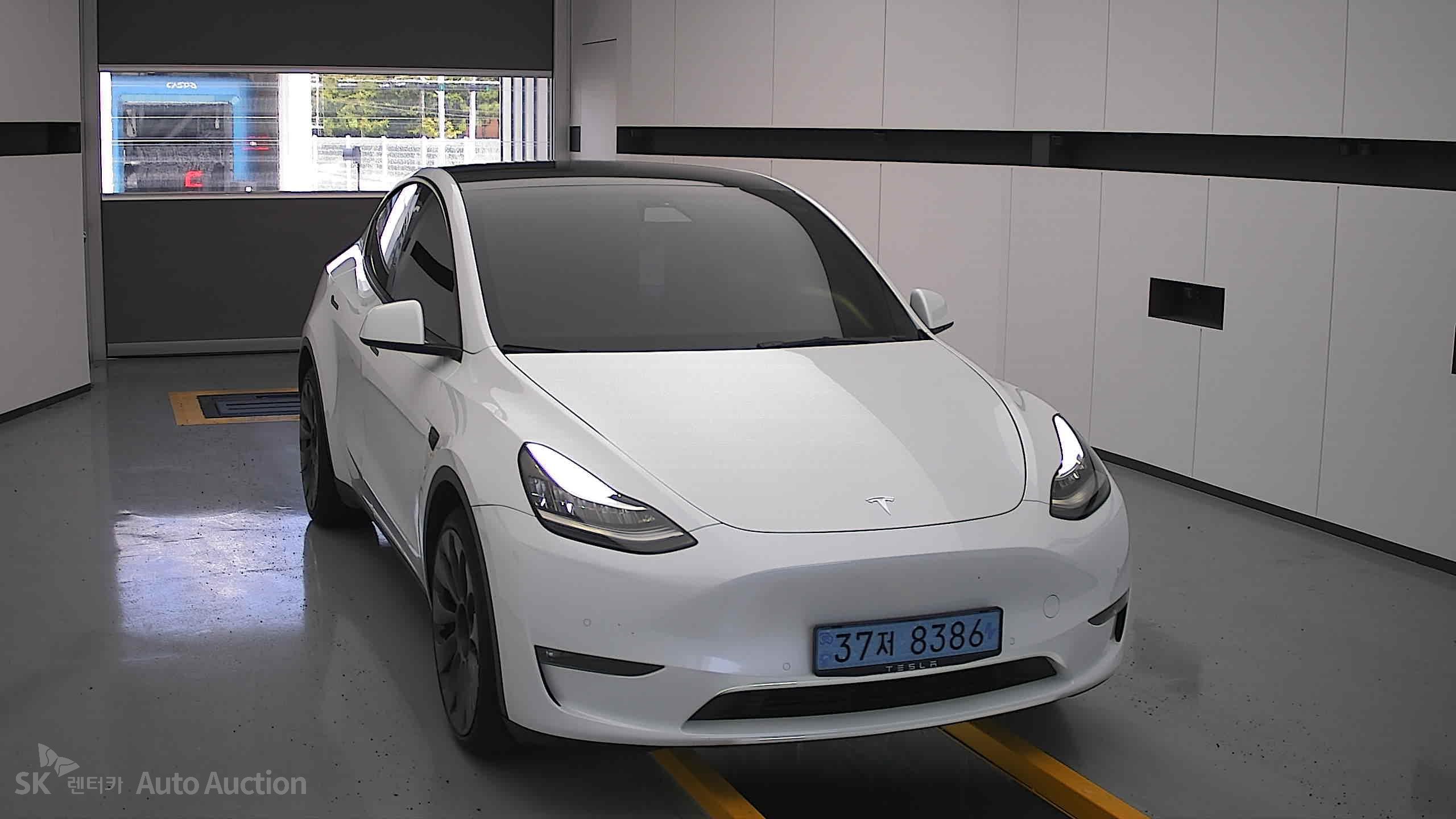 Tesla Model Y 2022 — صورة 22