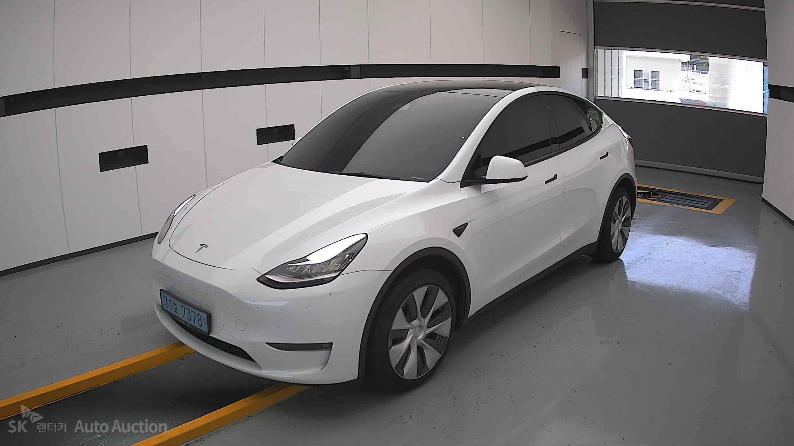 Tesla Model Y 2022 — صورة 11