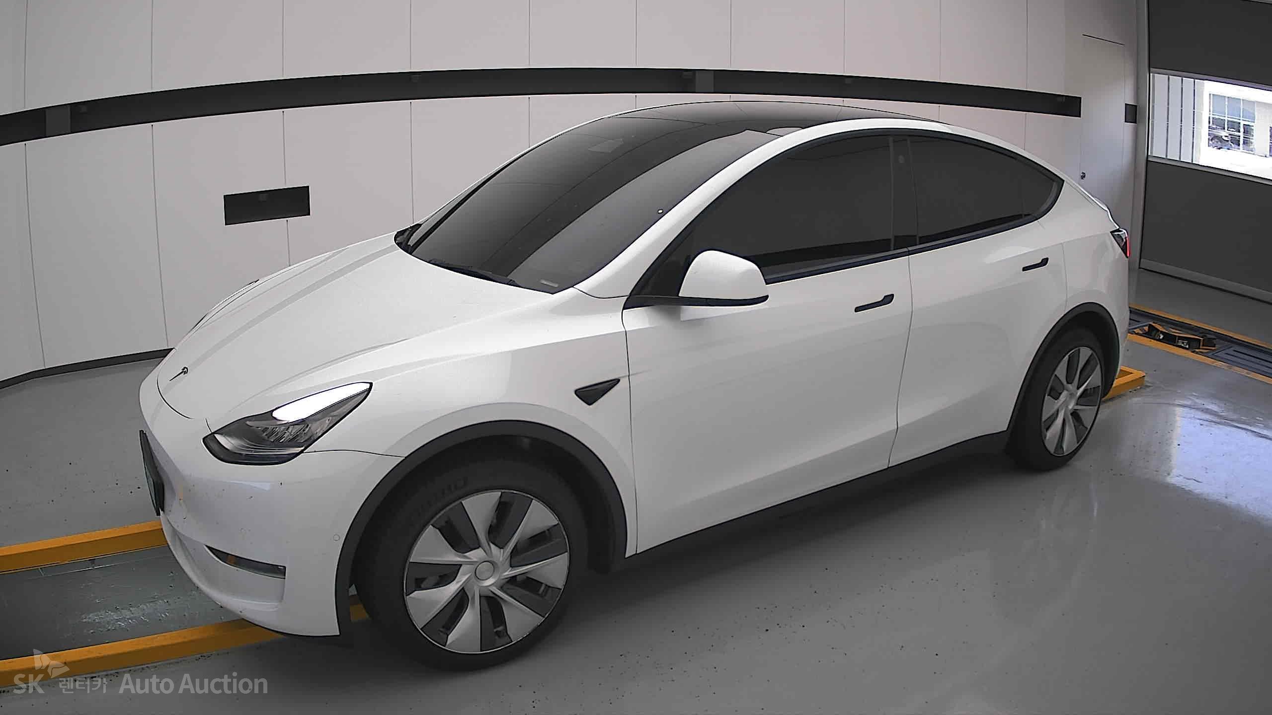 Tesla Model Y 2022 — صورة 12