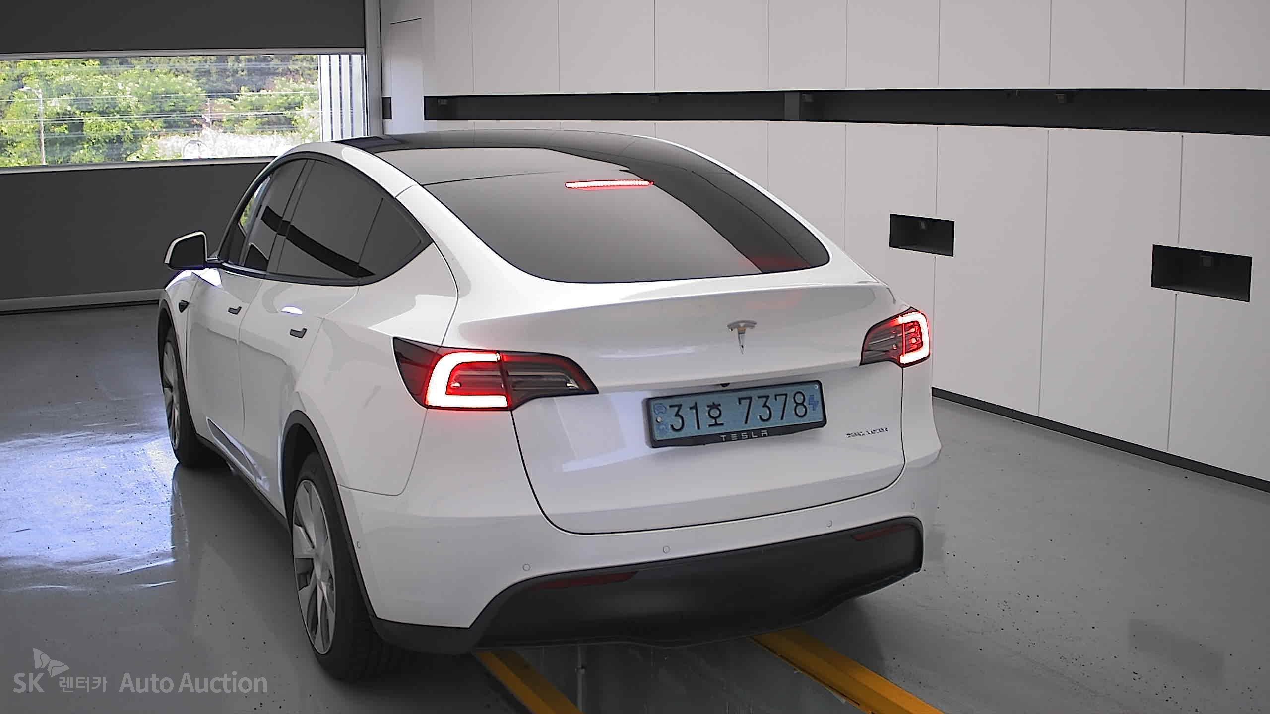 Tesla Model Y 2022 — صورة 15