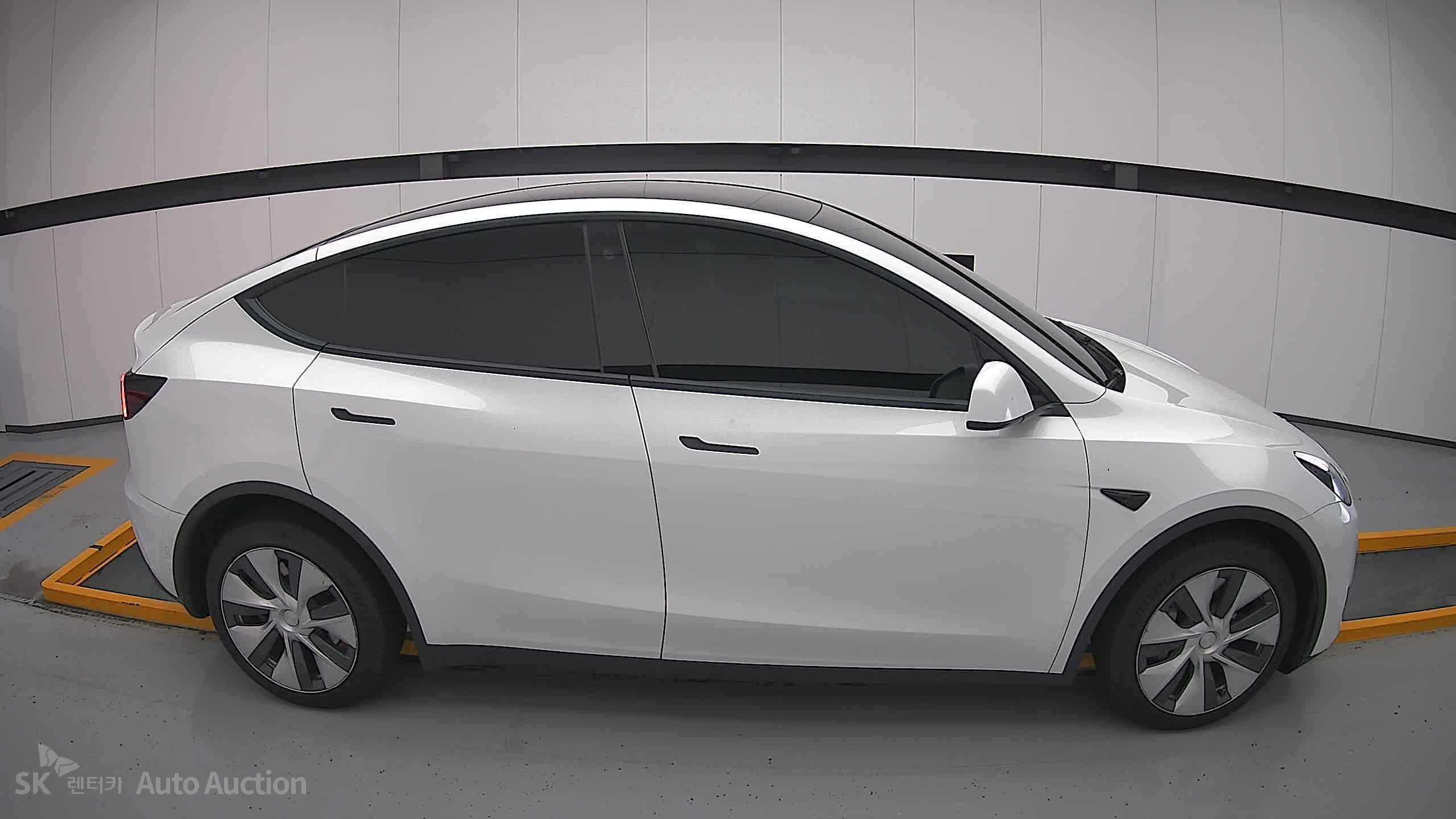 Tesla Model Y 2022 — صورة 19