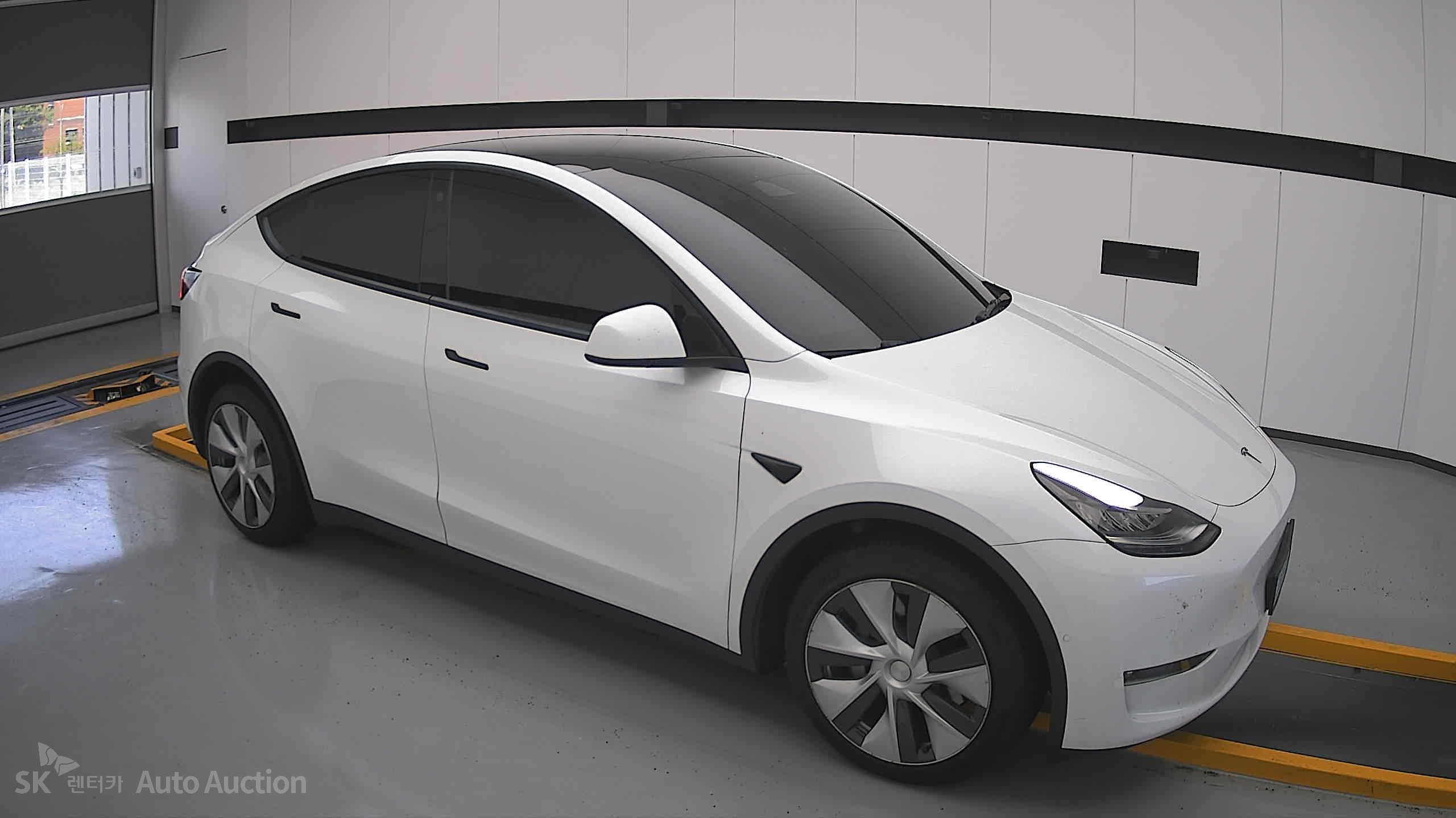 Tesla Model Y 2022 — صورة 20