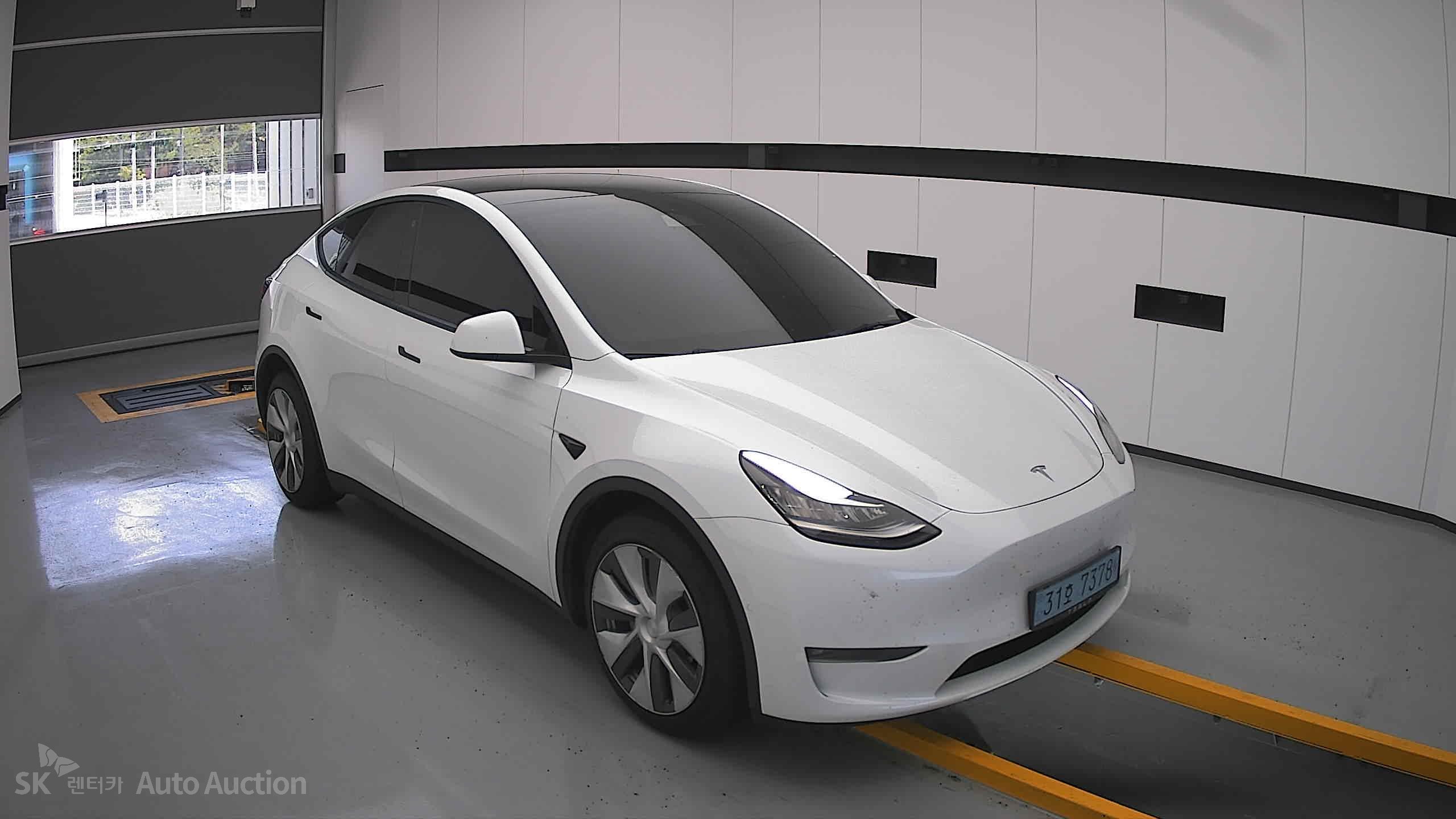 Tesla Model Y 2022 — صورة 21