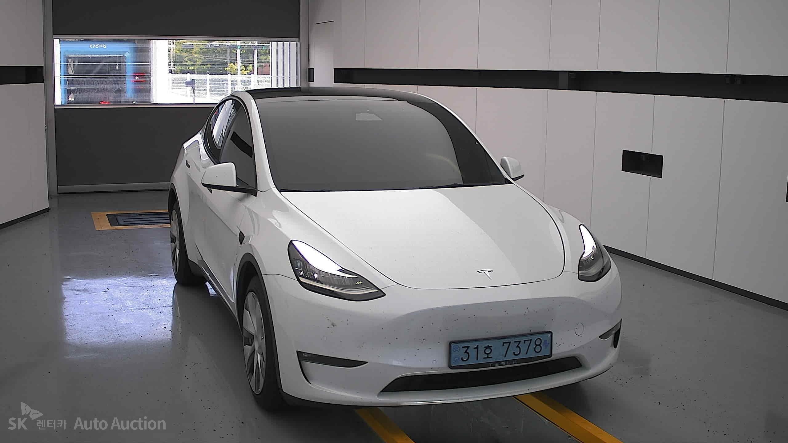 Tesla Model Y 2022 — صورة 22