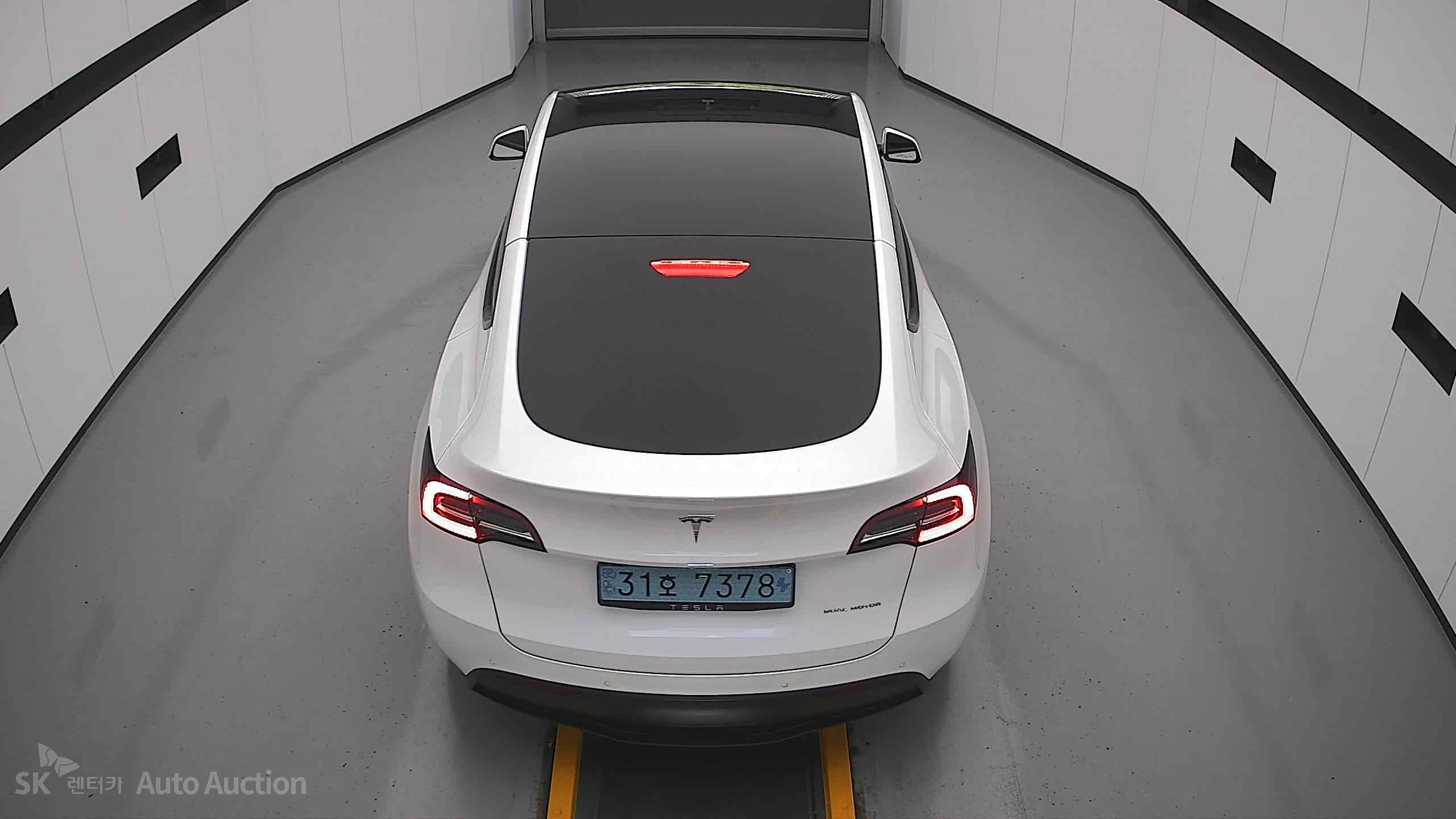 Tesla Model Y 2022 — صورة 23