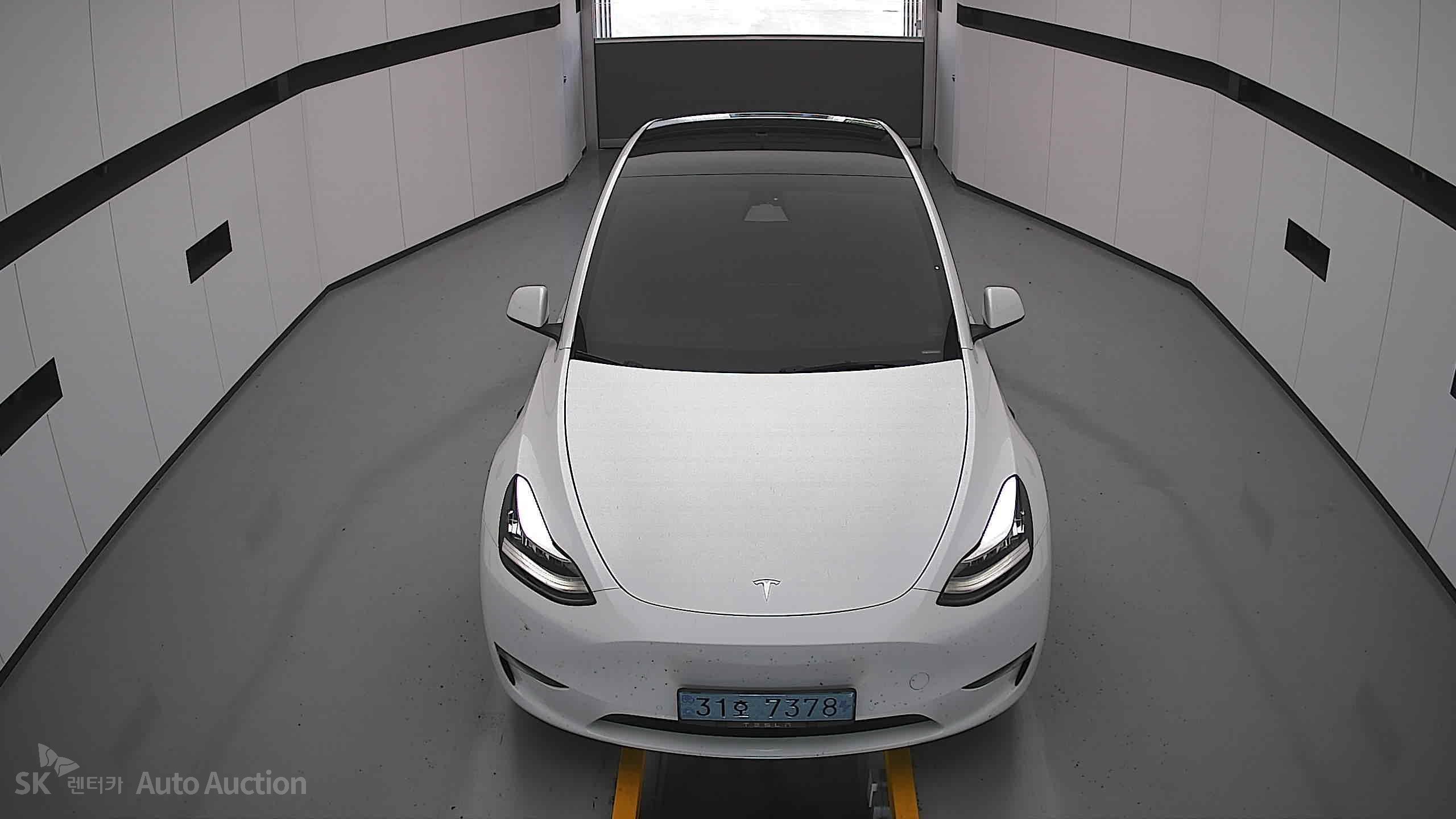 Tesla Model Y 2022 — صورة 24