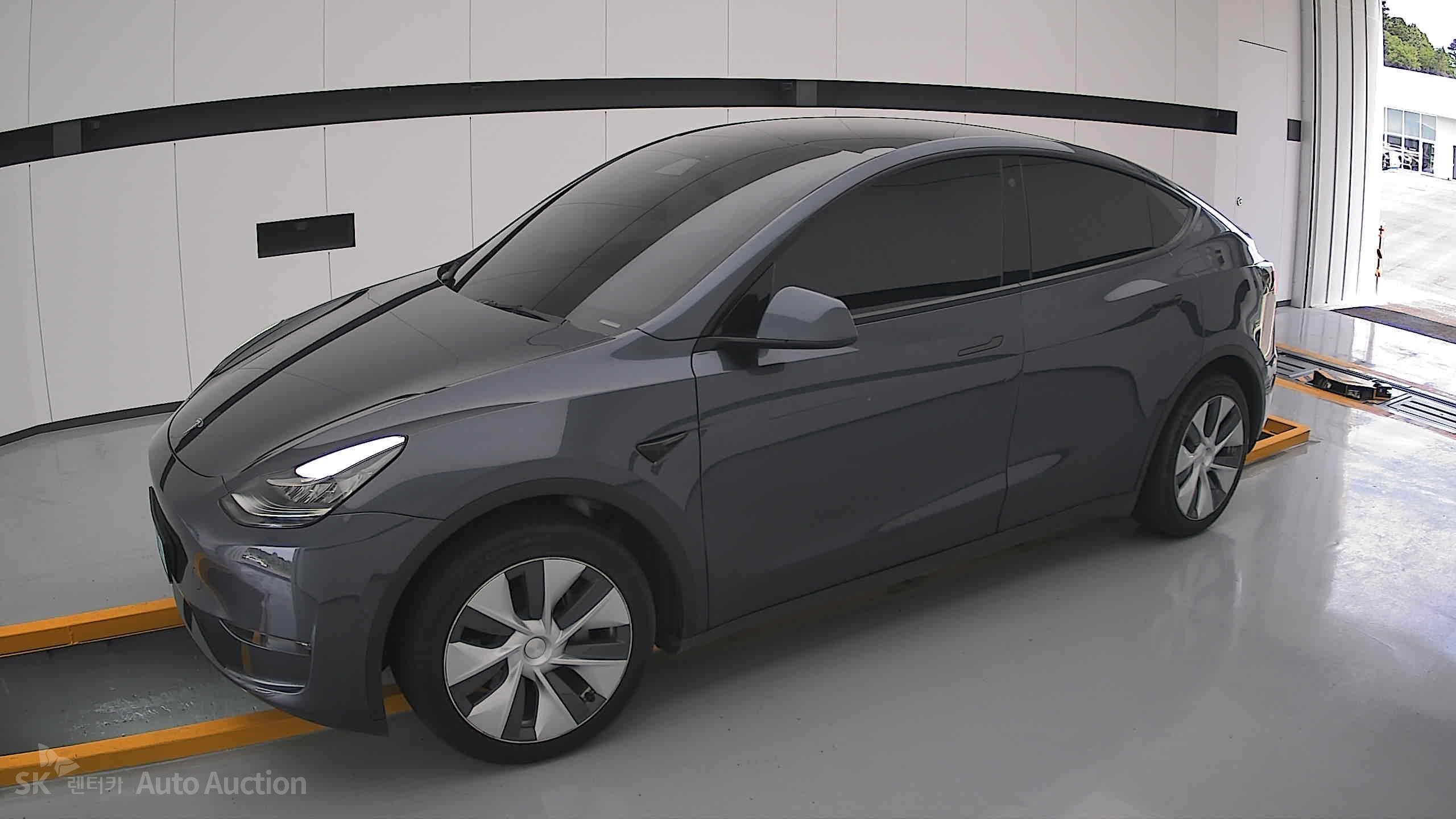 Tesla Model Y 2022 — صورة 12