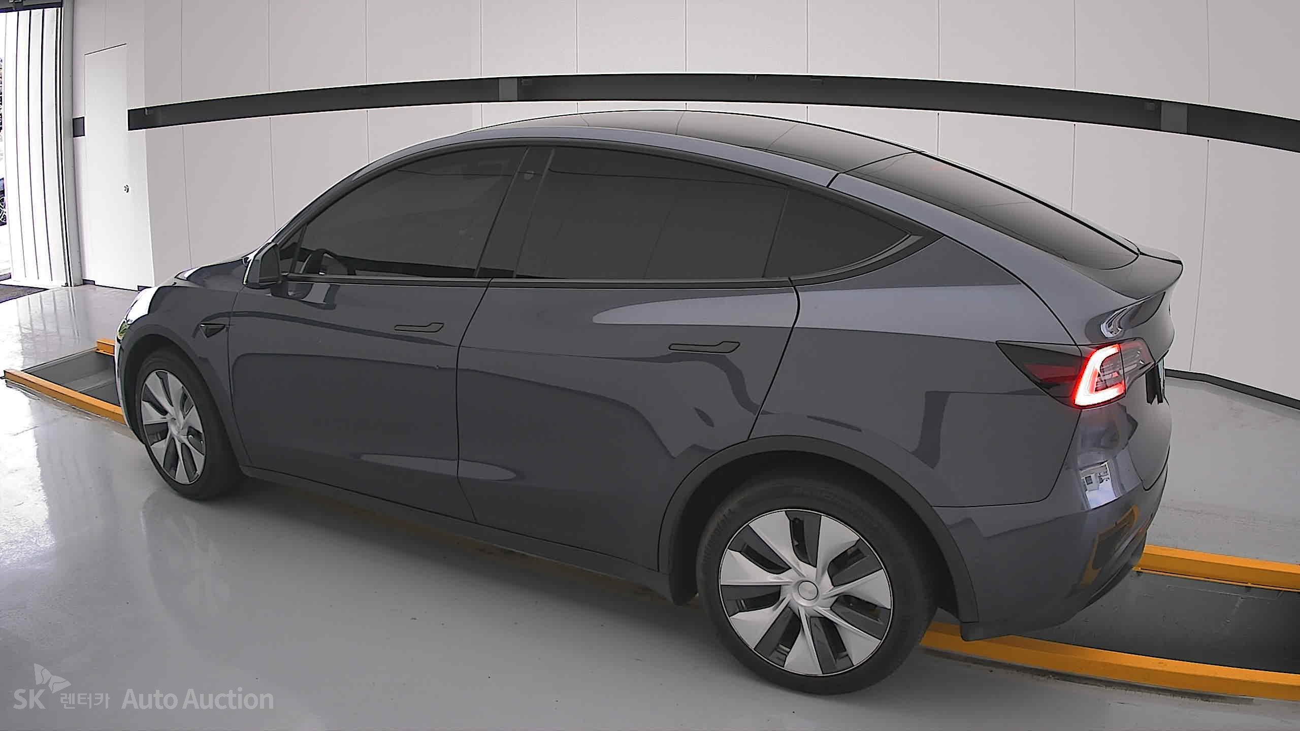 Tesla Model Y 2022 — صورة 14