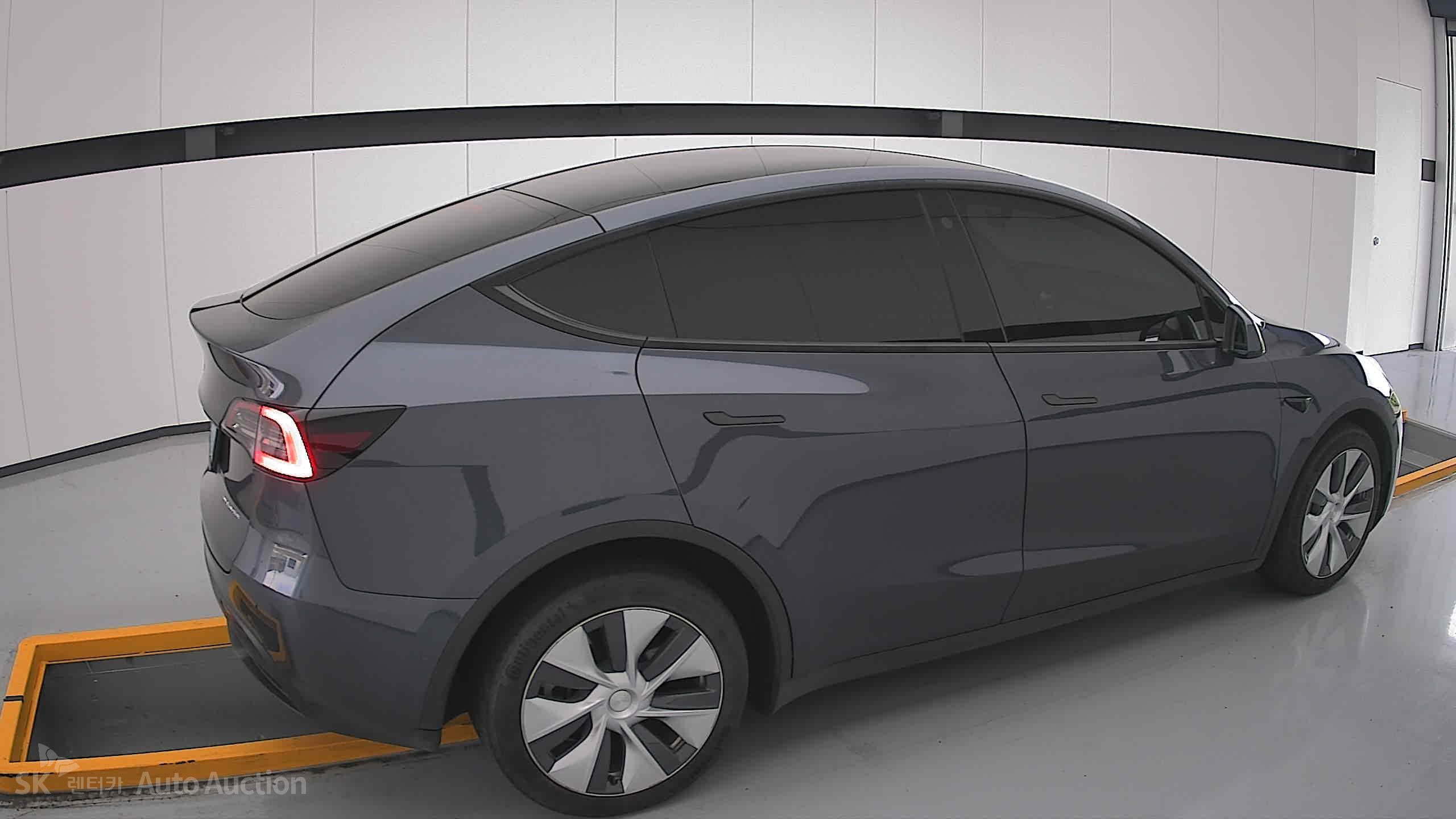 Tesla Model Y 2022 — صورة 18