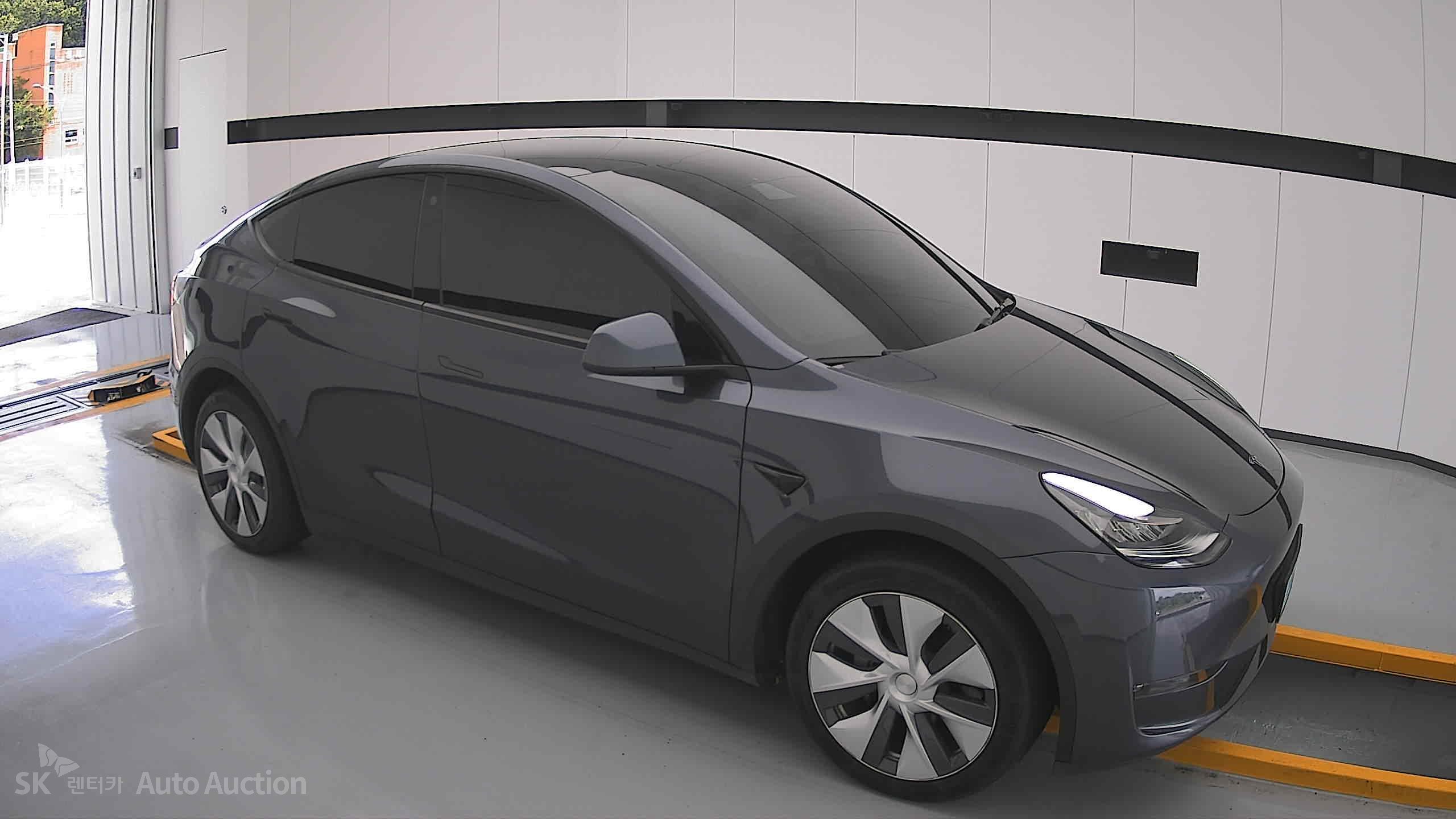 Tesla Model Y 2022 — صورة 20