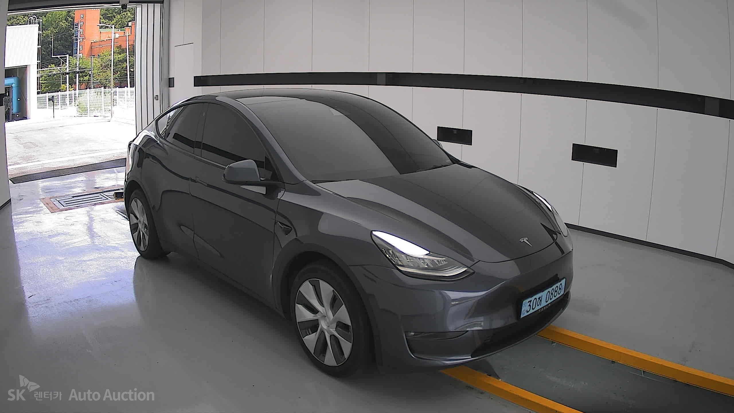 Tesla Model Y 2022 — صورة 21