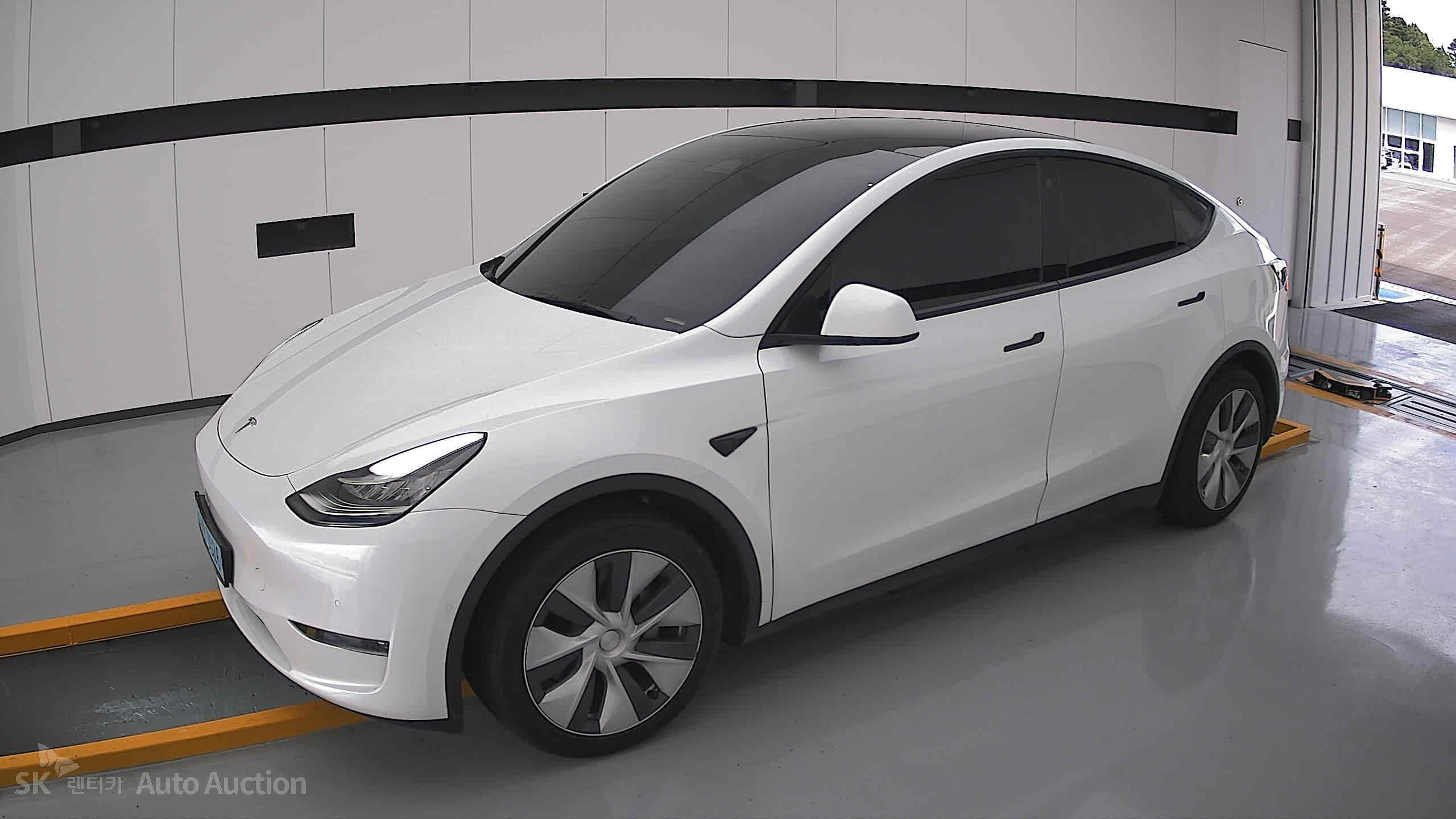 Tesla Model Y 2022 — صورة 12