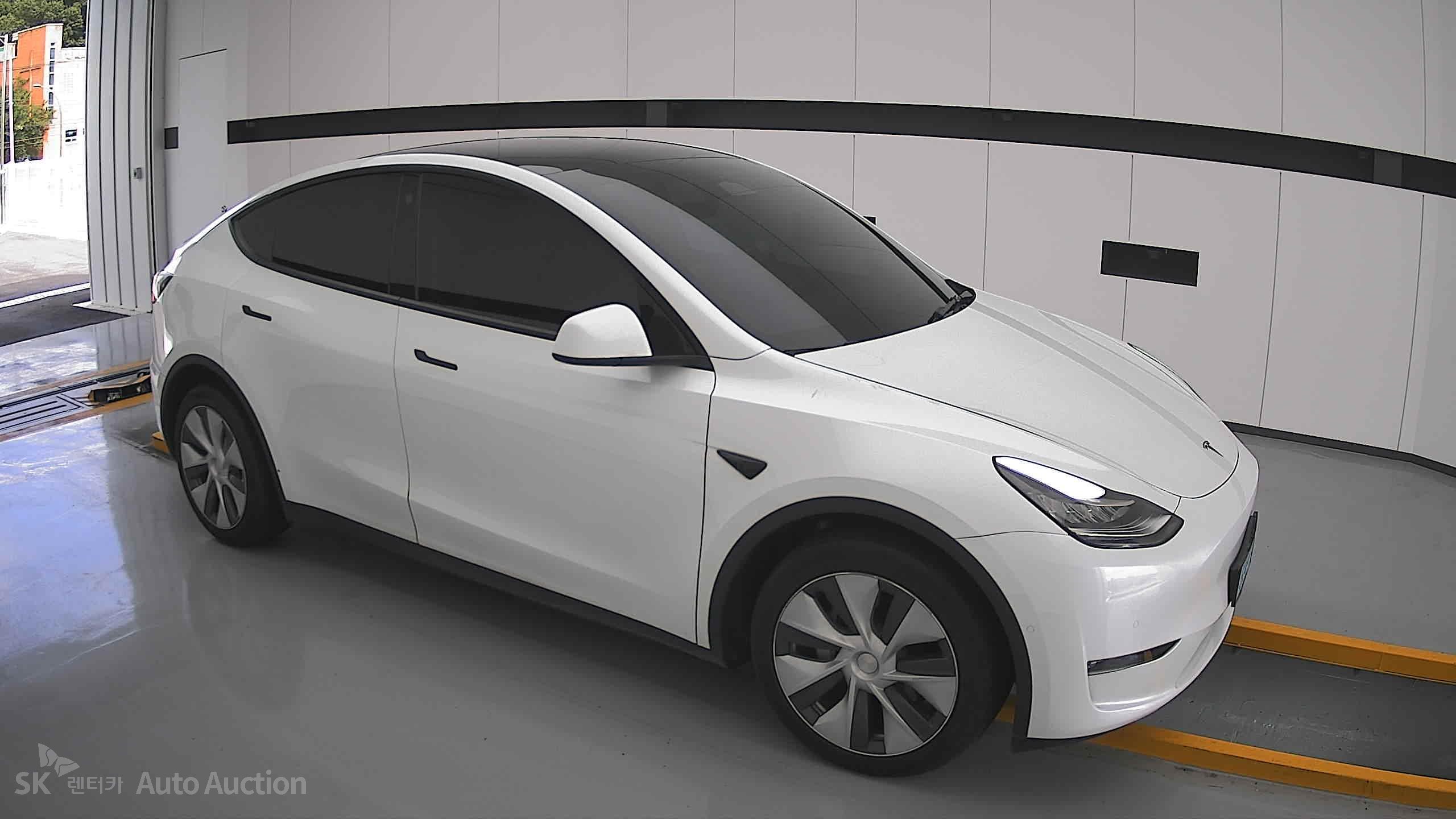 Tesla Model Y 2022 — صورة 20
