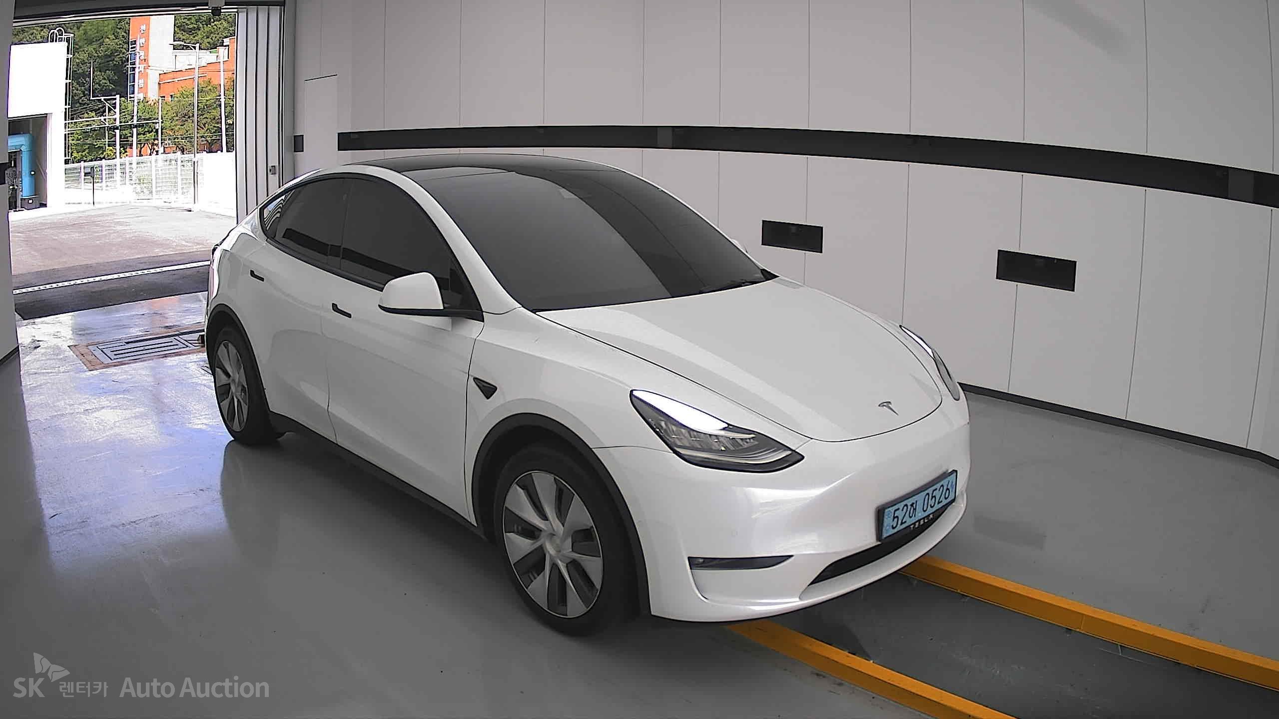 Tesla Model Y 2022 — صورة 21