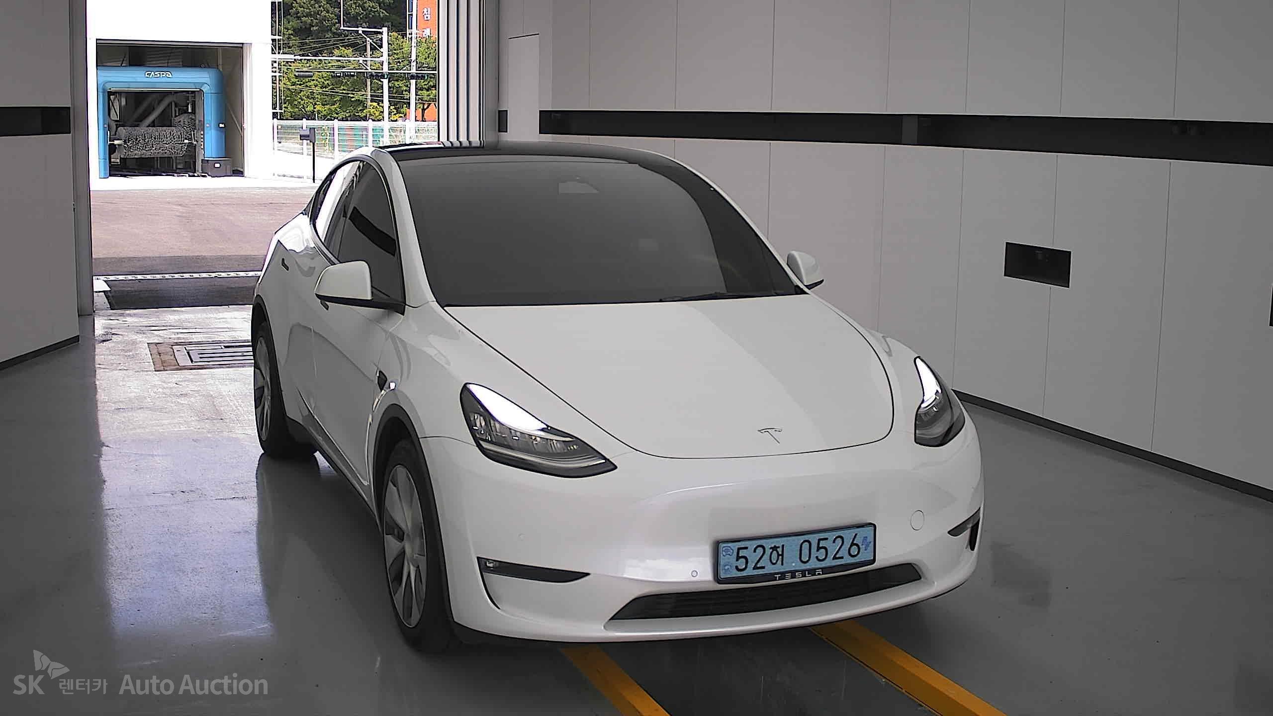 Tesla Model Y 2022 — صورة 22