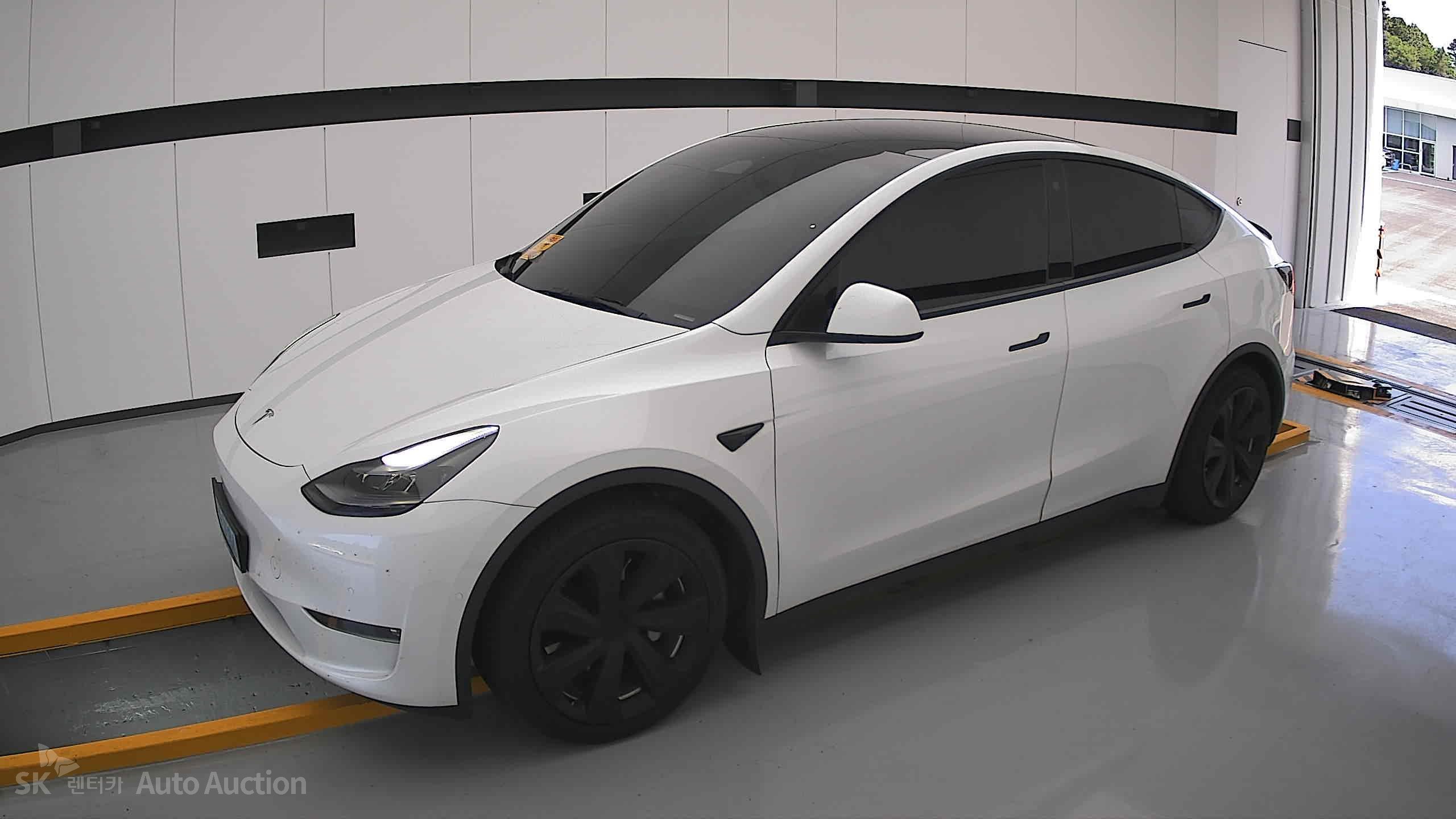 Tesla Model Y 2022 — صورة 12
