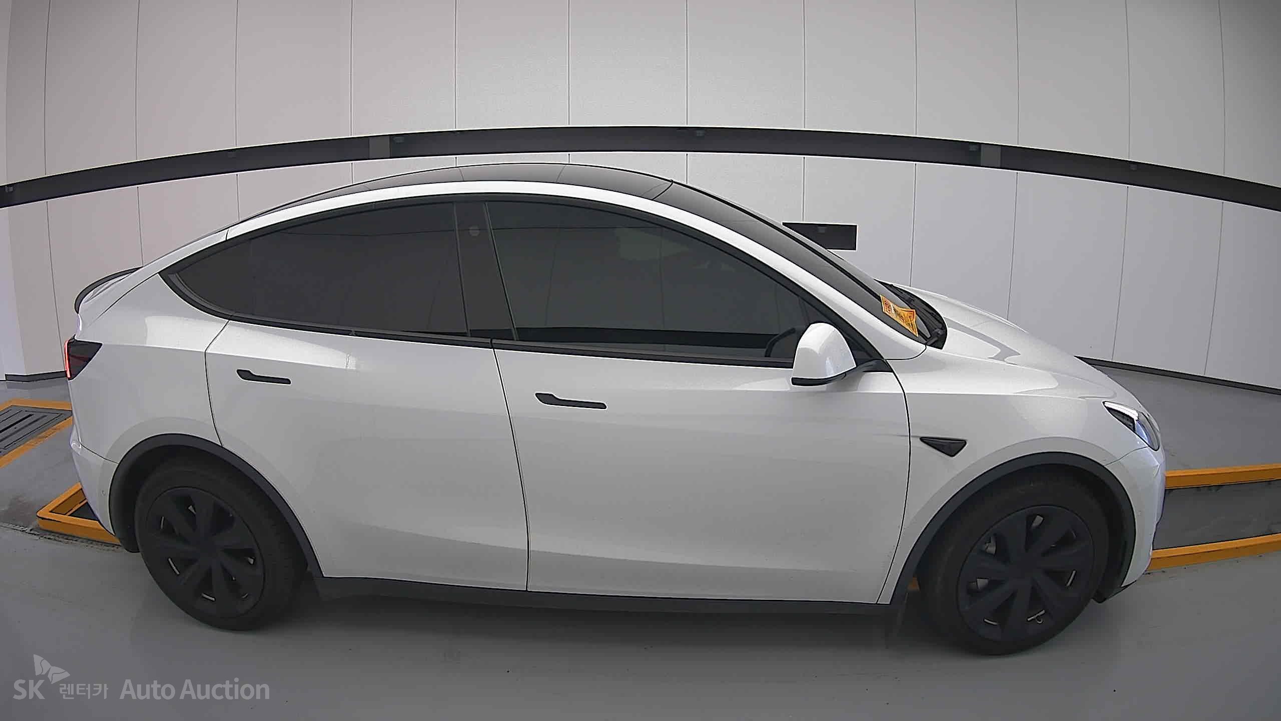 Tesla Model Y 2022 — صورة 19