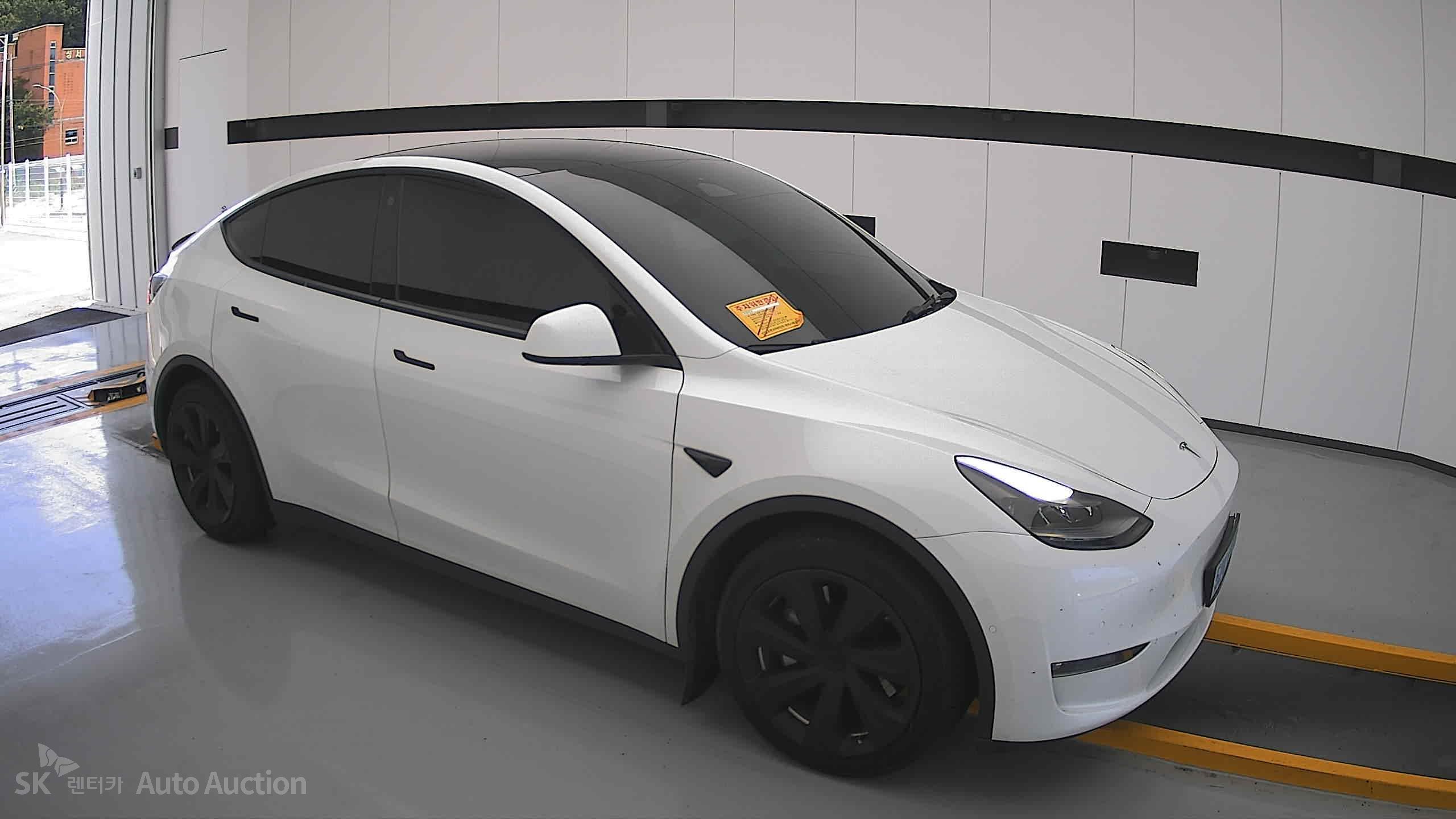 Tesla Model Y 2022 — صورة 20