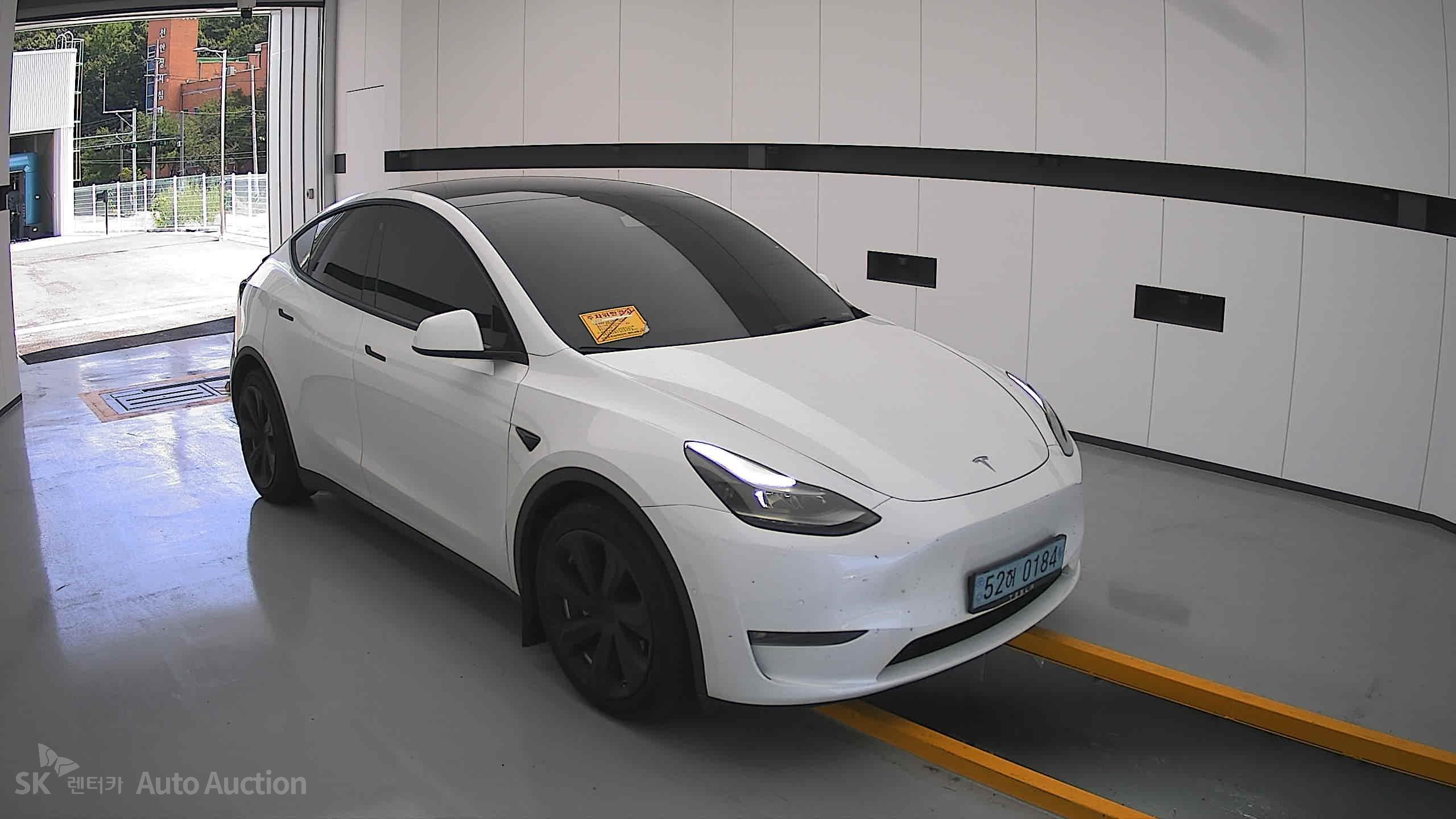 Tesla Model Y 2022 — صورة 21