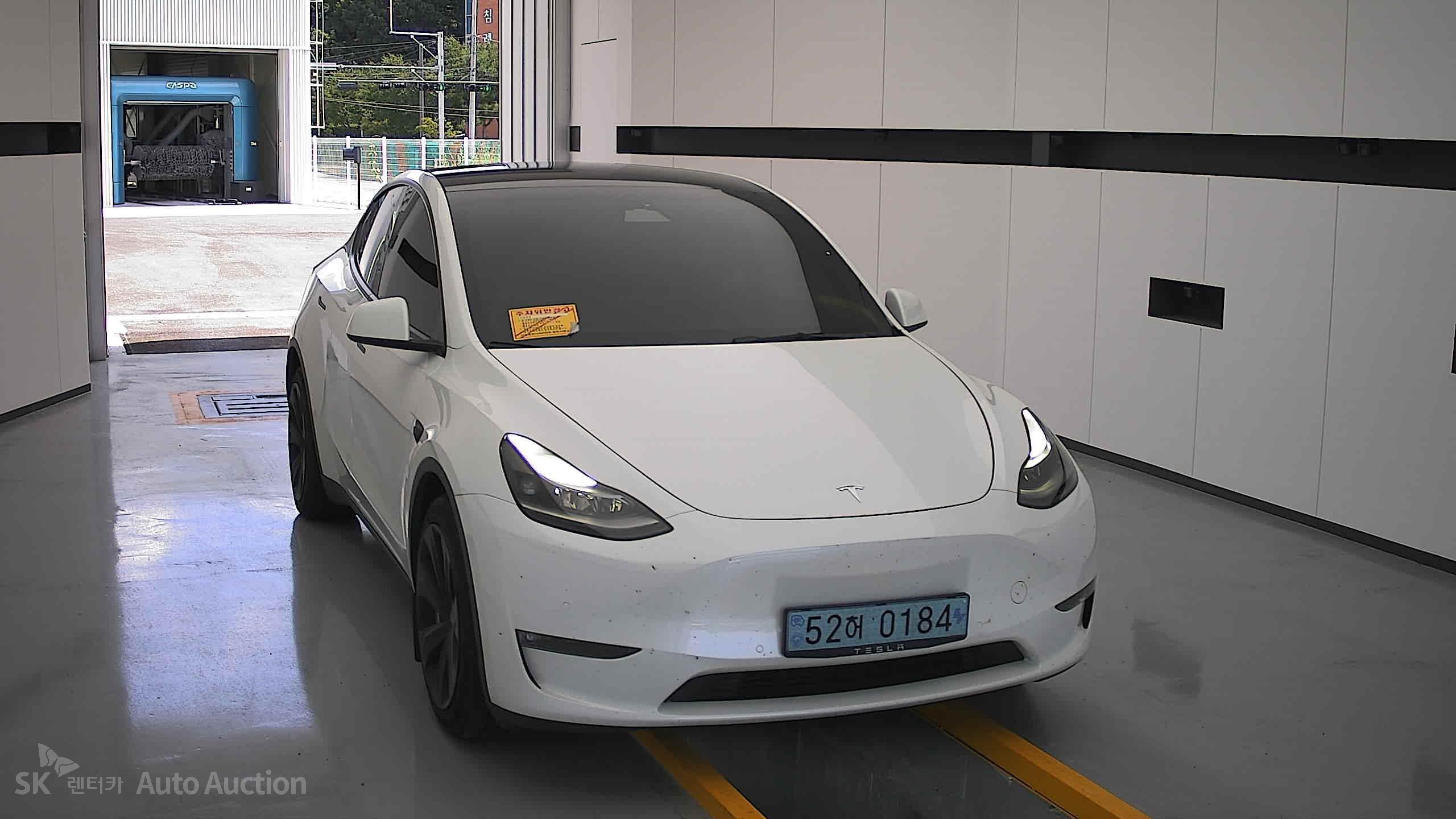 Tesla Model Y 2022 — صورة 22