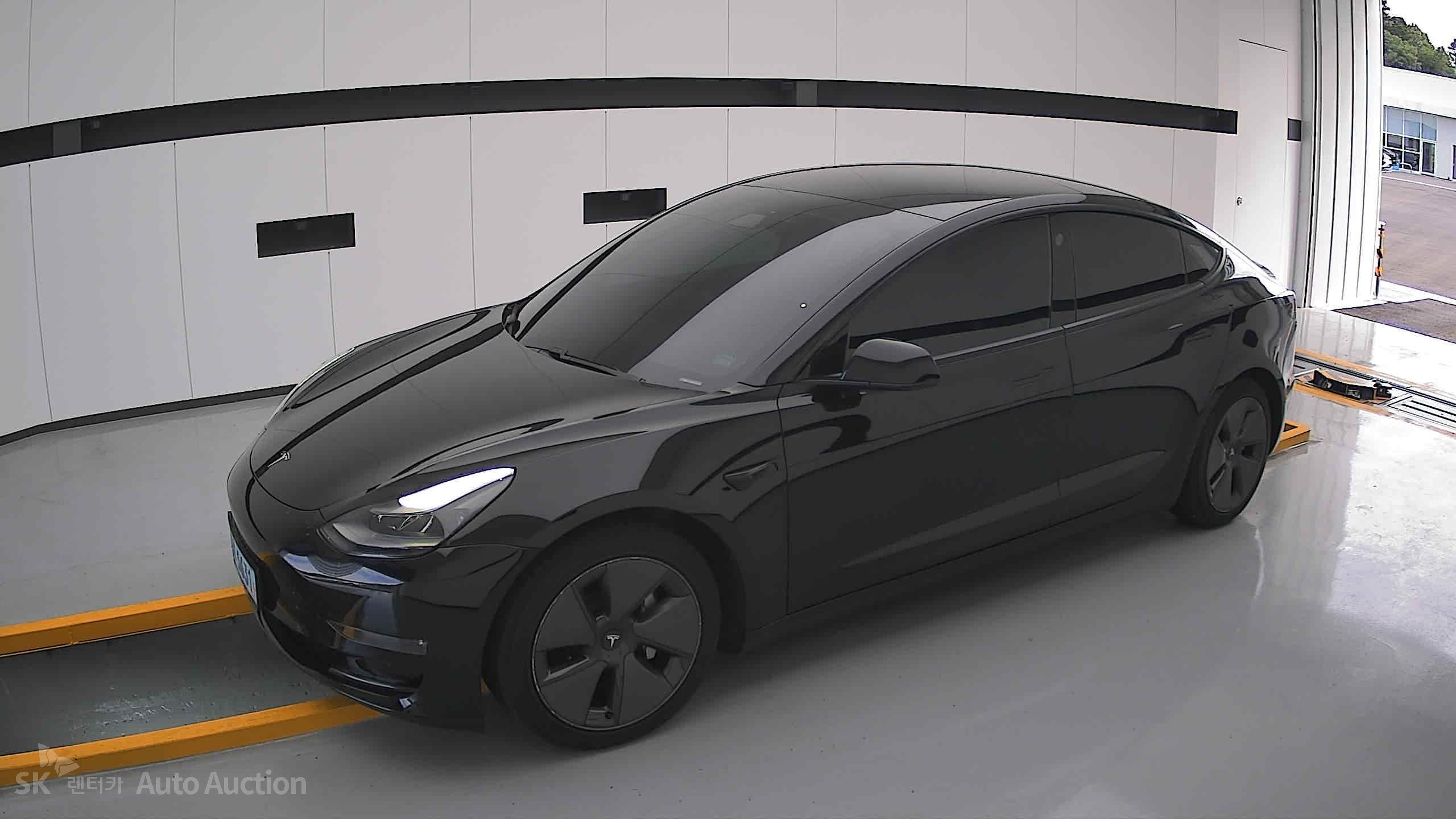 Tesla Model 3 2021 — صورة 12