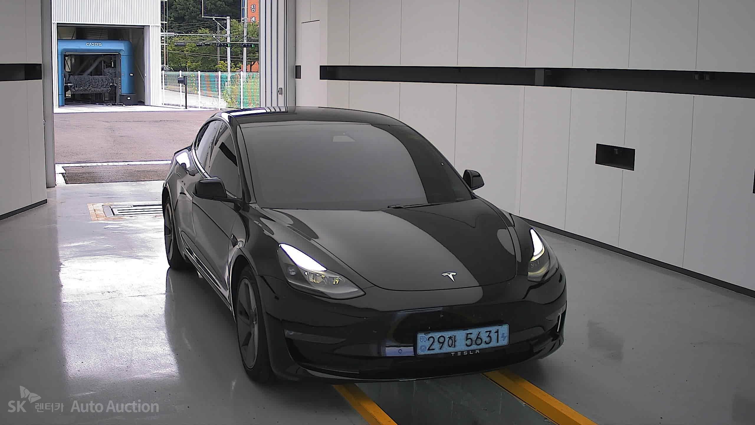 Tesla Model 3 2021 — صورة 22