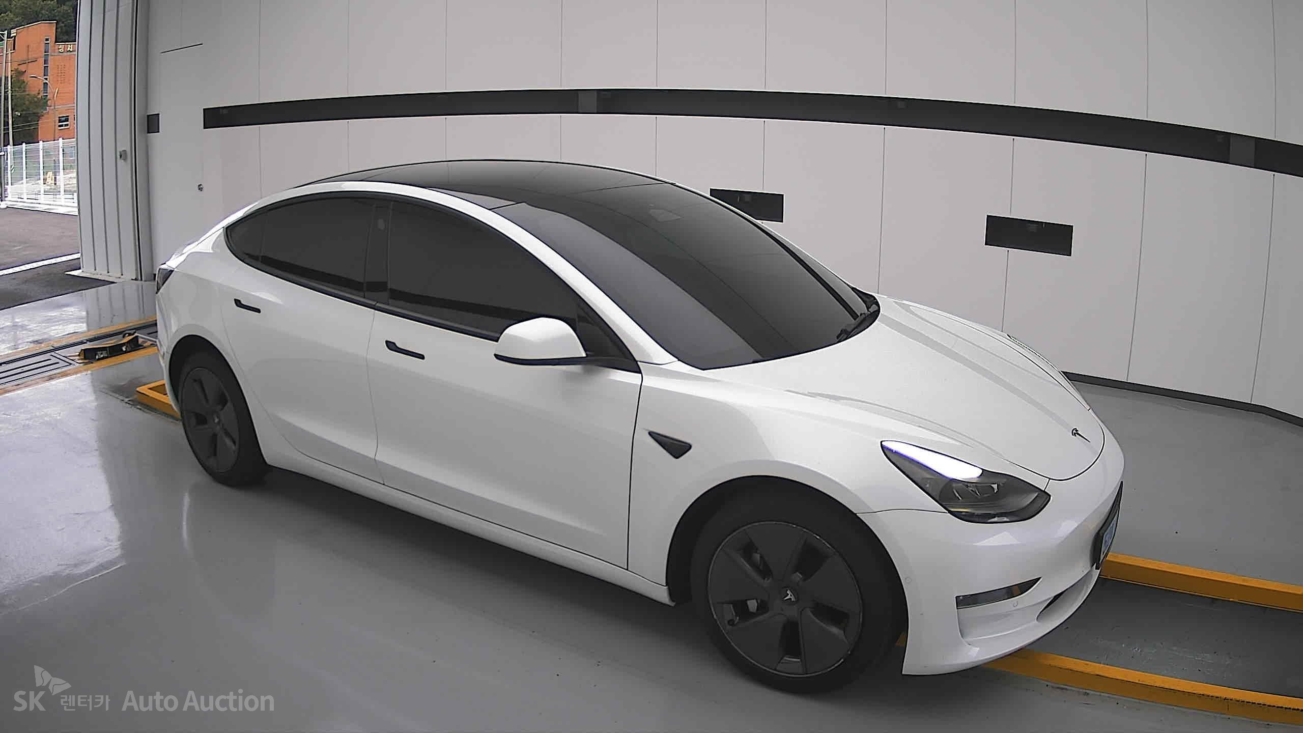 Tesla Model 3 2022 — صورة 20