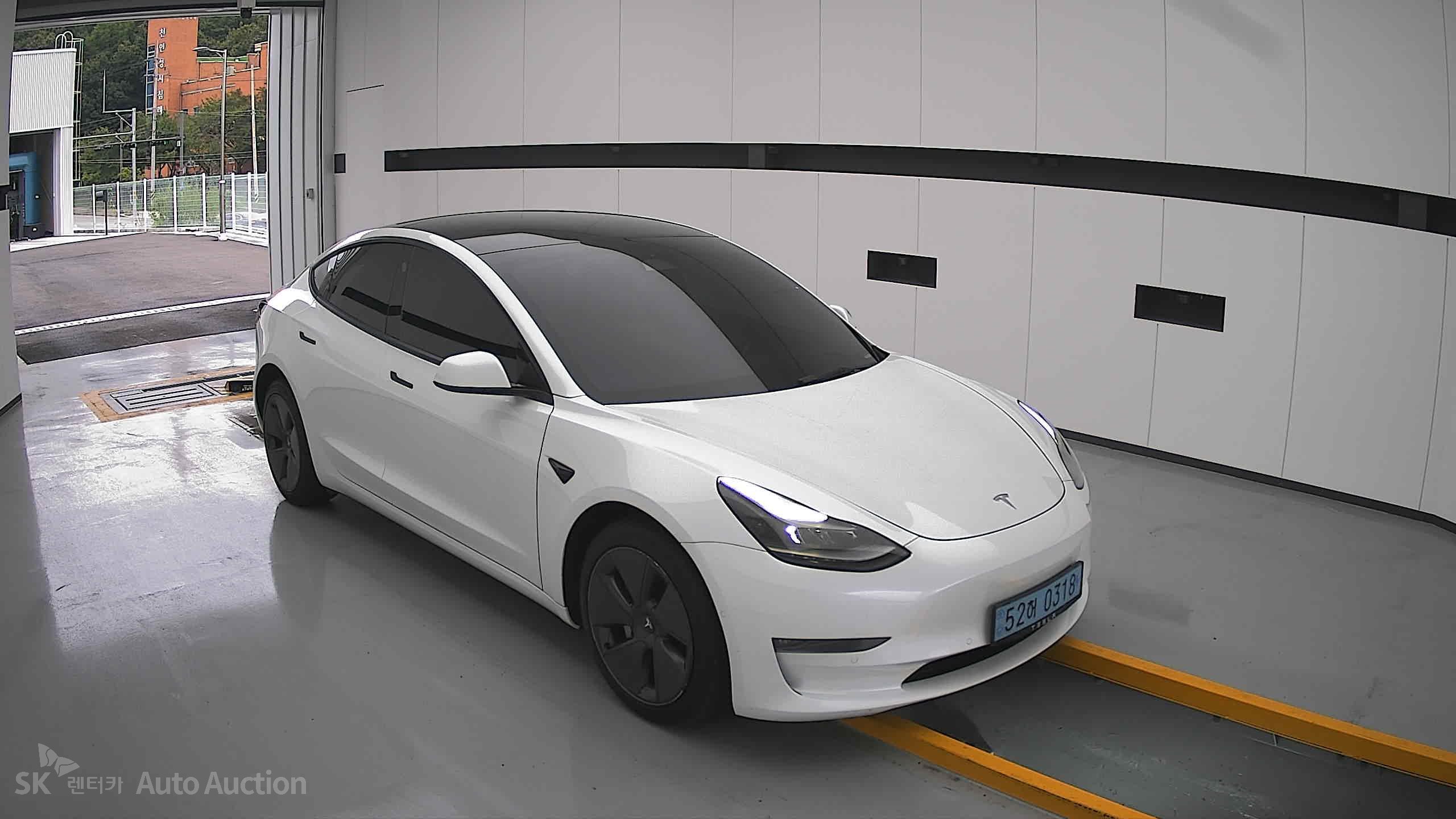 Tesla Model 3 2022 — صورة 21