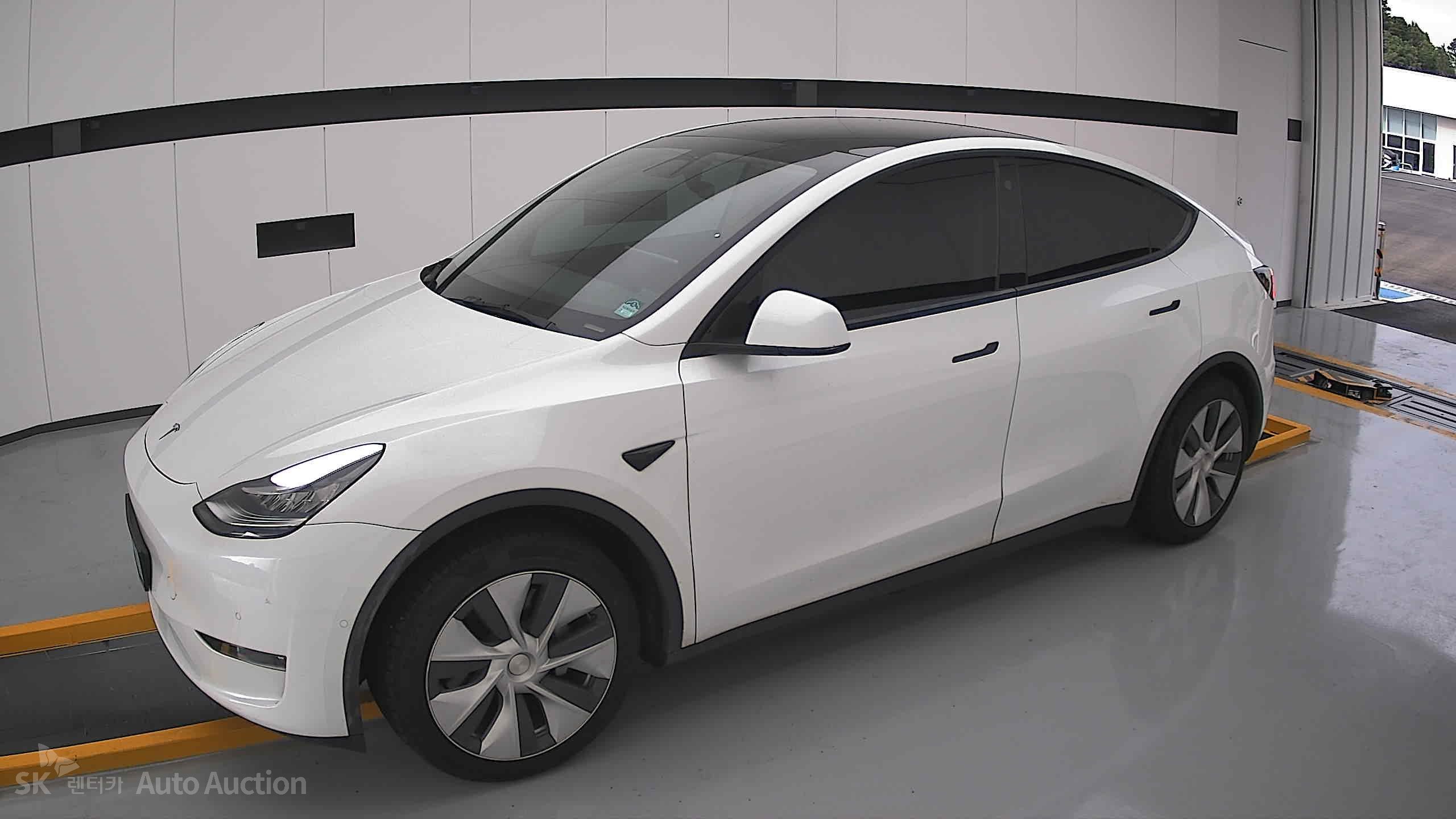 Tesla Model Y 2021 — صورة 12