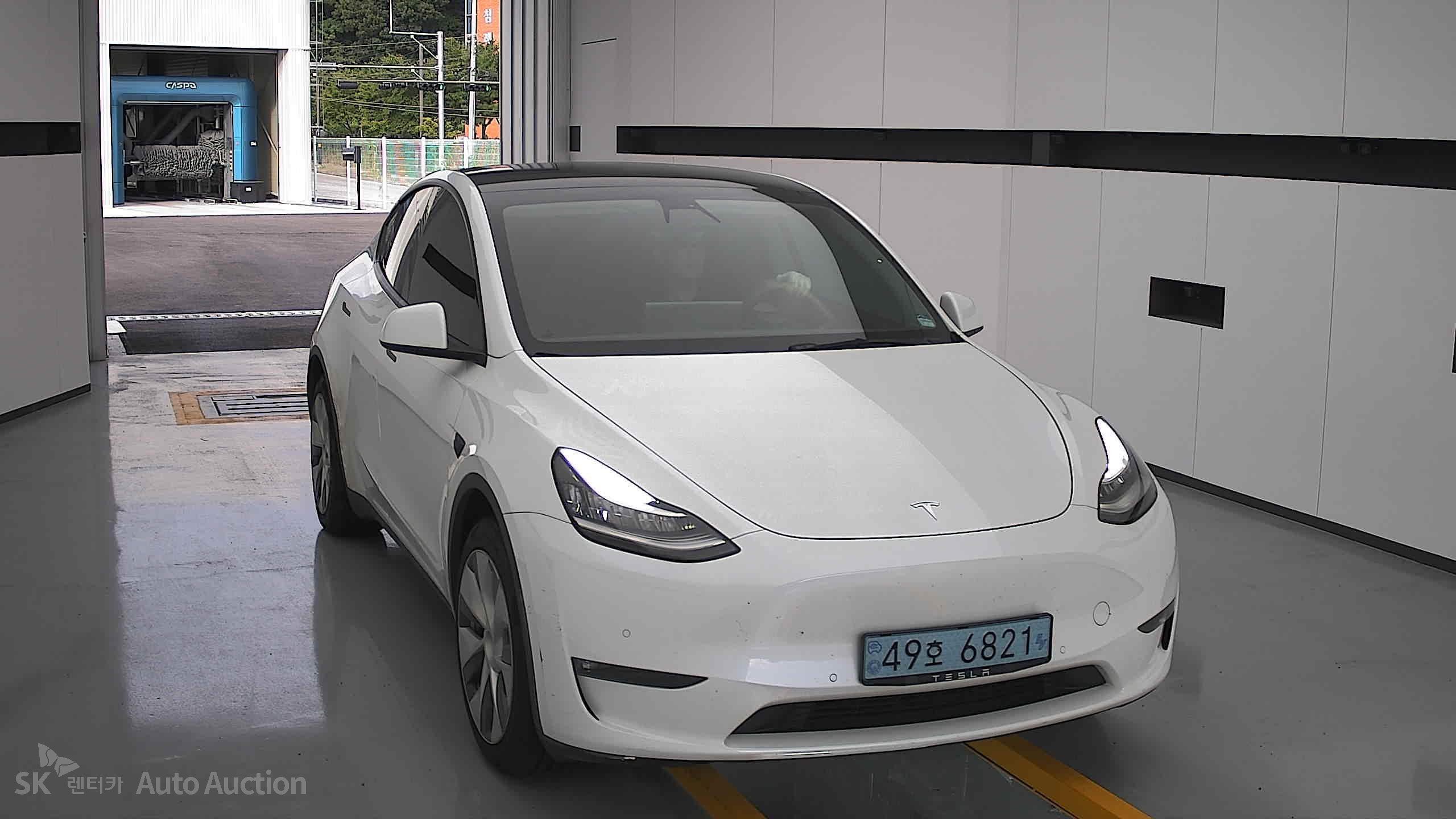 Tesla Model Y 2021 — صورة 22